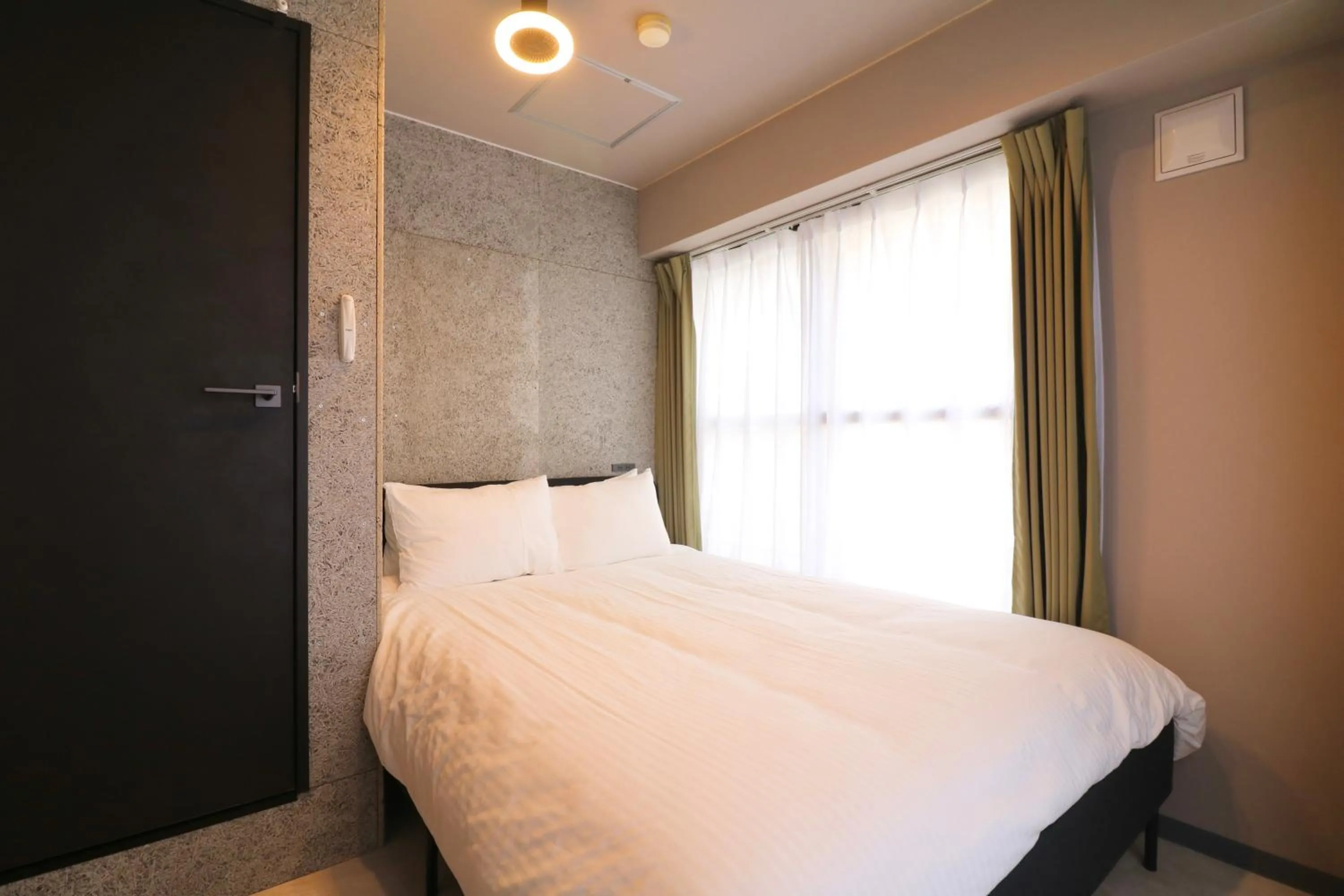 Bed in Maison Sapporo