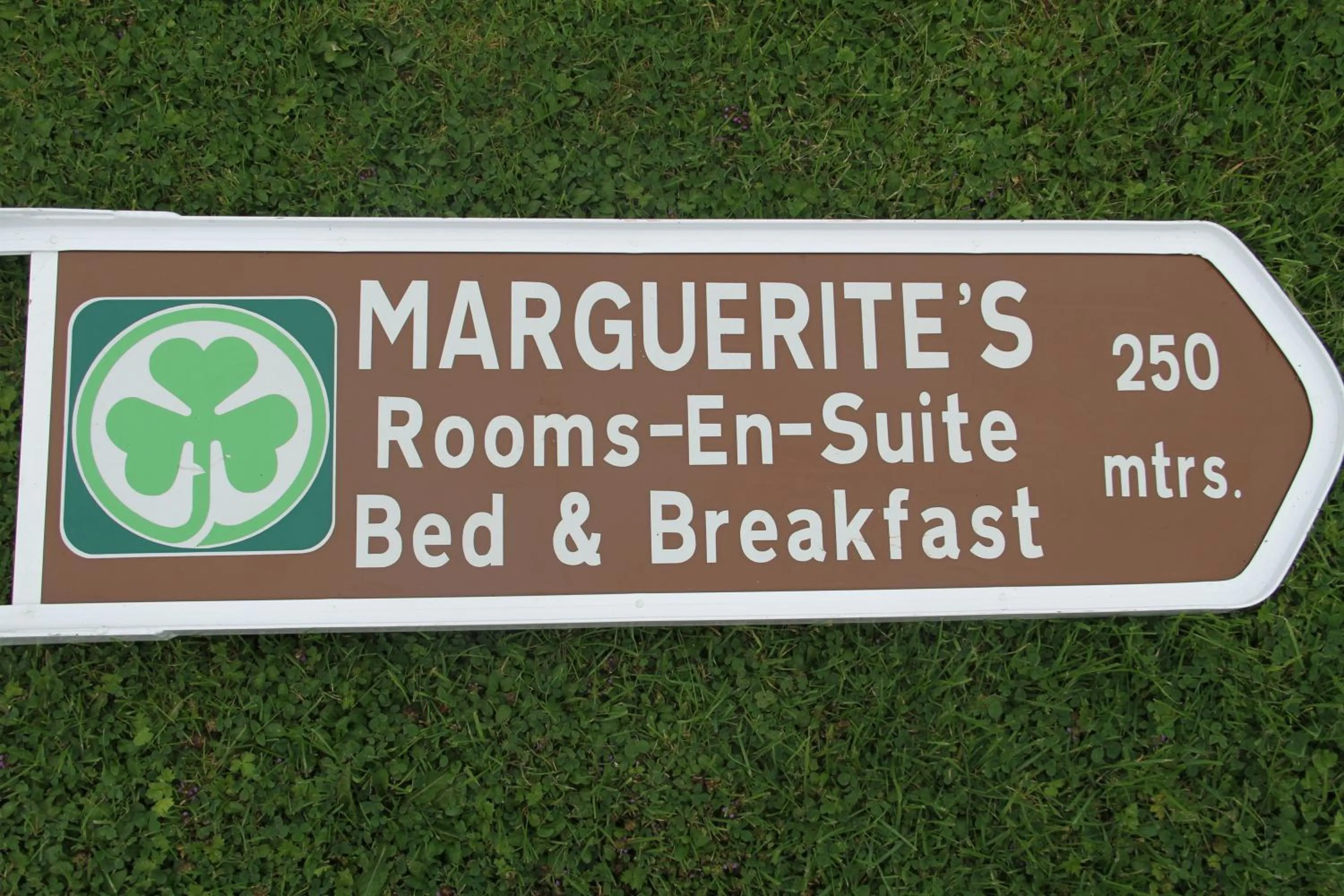 Property logo or sign in Marguerite's B&B