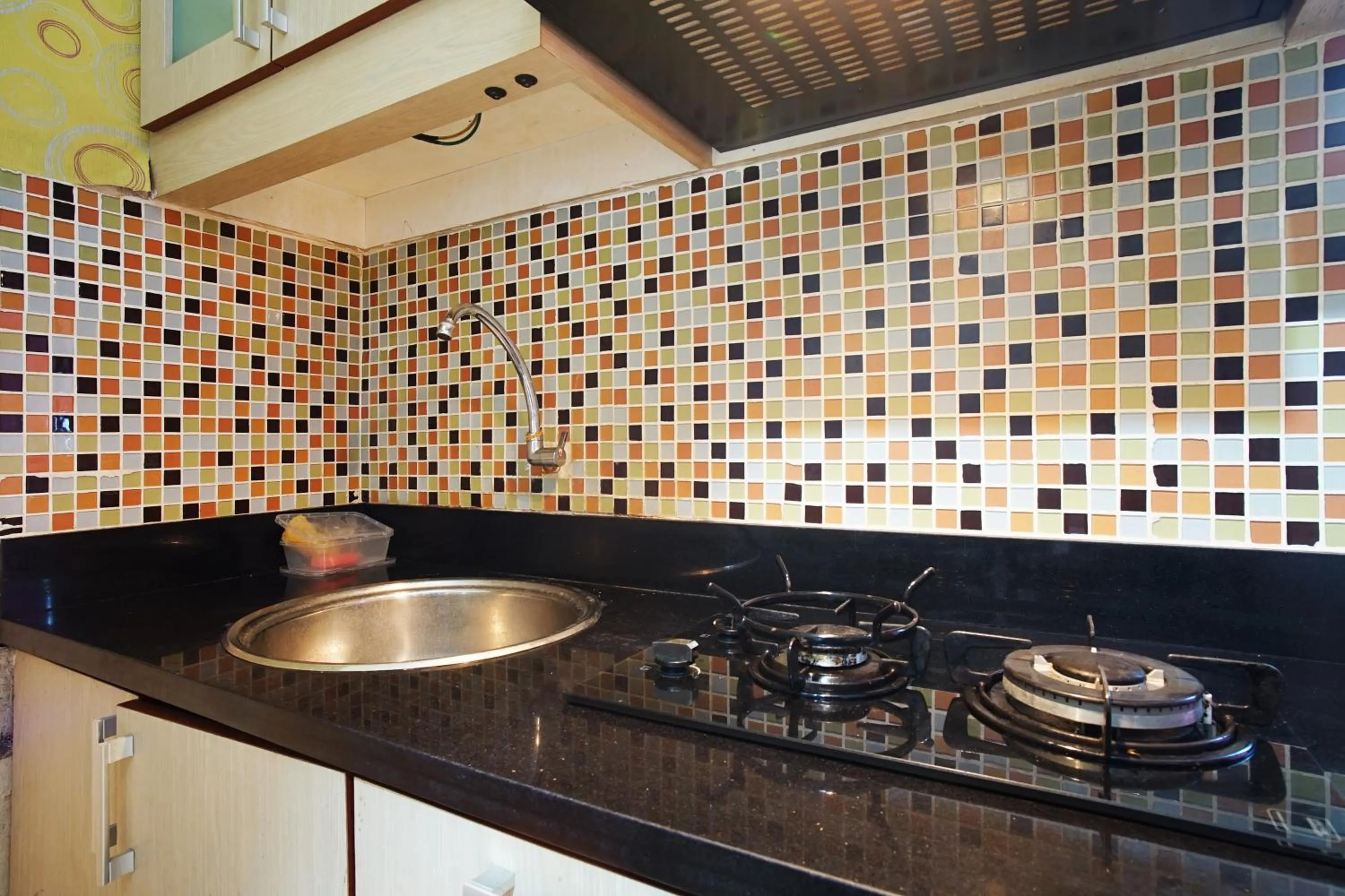 Kitchen or kitchenette in Planet Room Kemang View