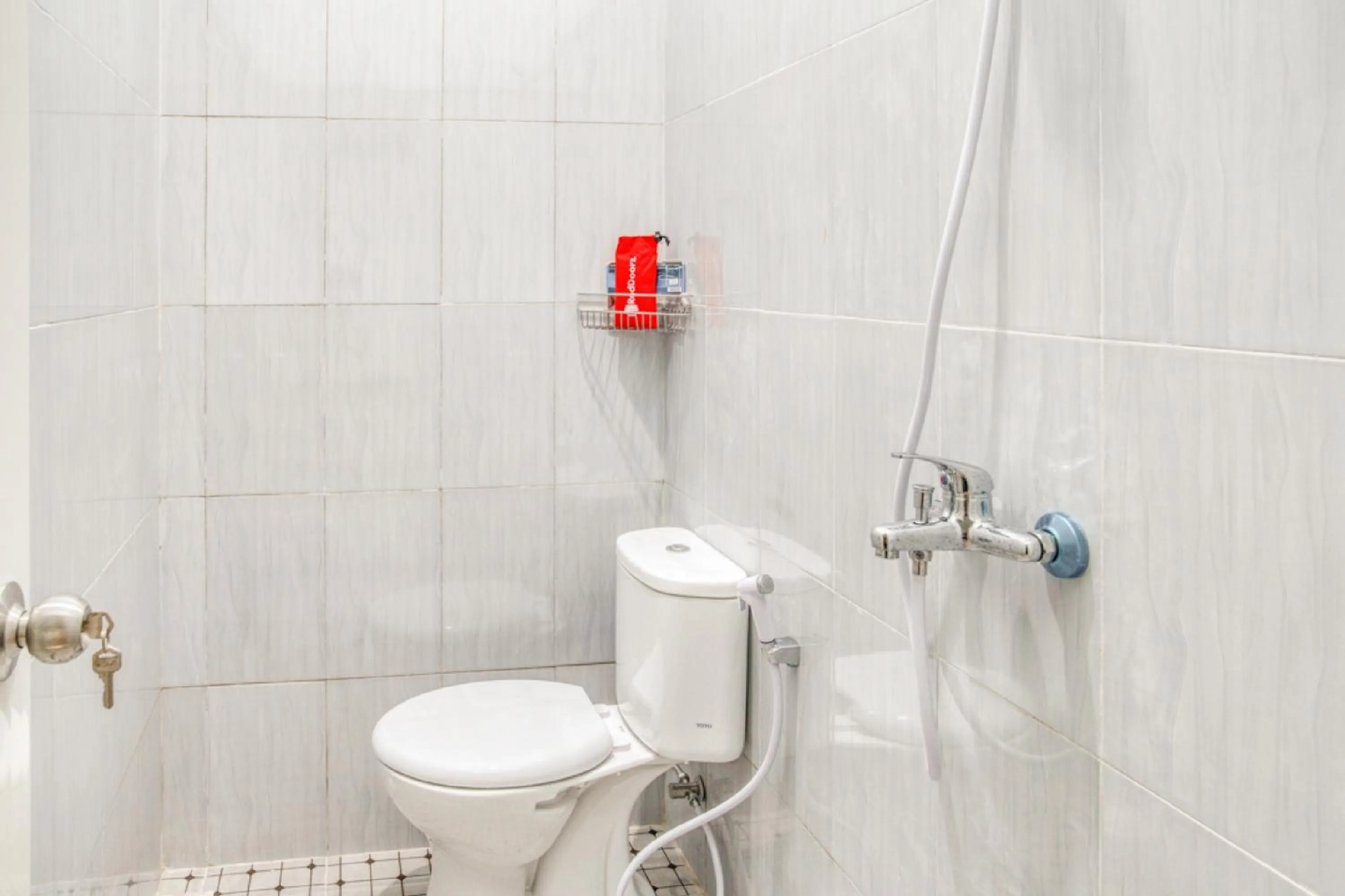 Bathroom in RedDoorz near Taman Mini Jakarta