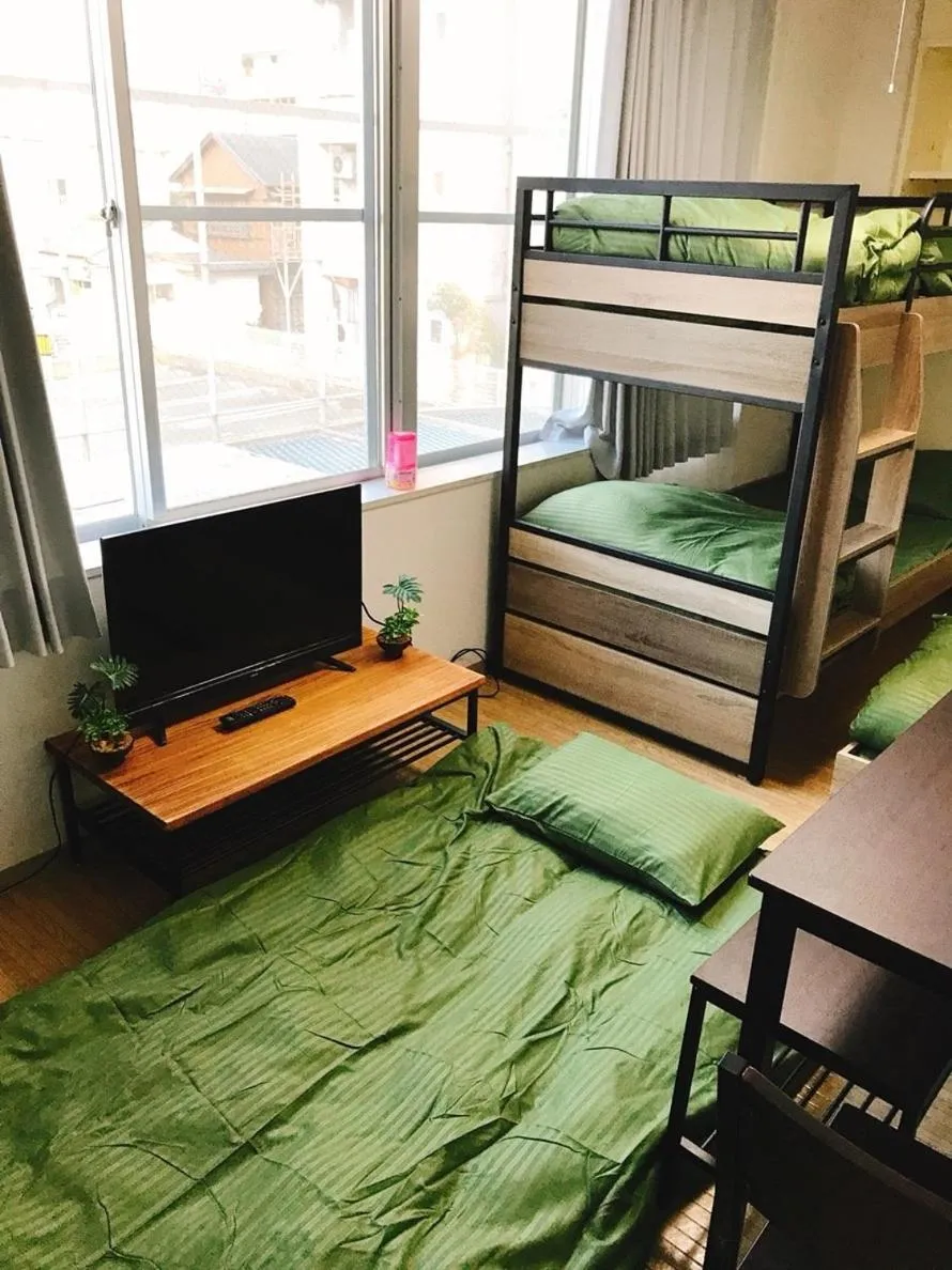 Bed in Joinus Ise Apartment by Tranova