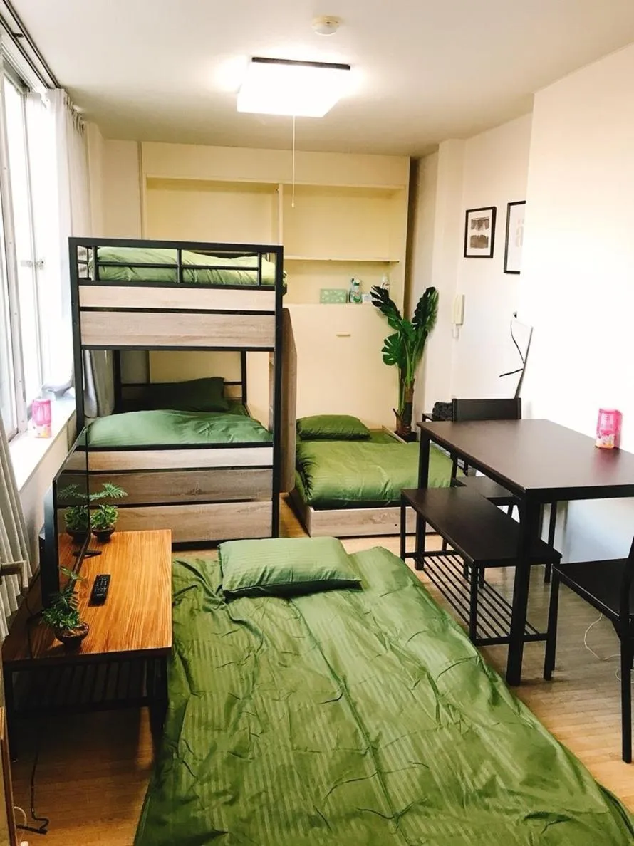 Bed in Joinus Ise Apartment by Tranova