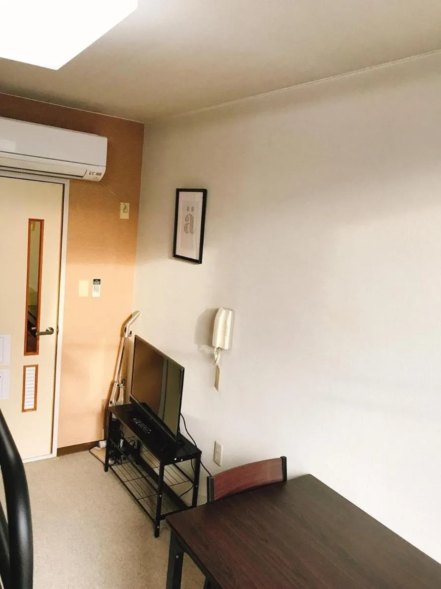 TV and multimedia in Joinus Ise Apartment by Tranova