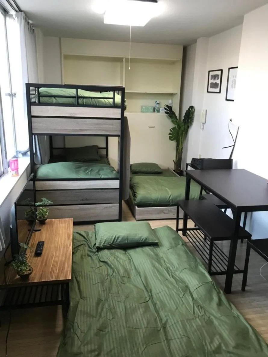 Bed in Joinus Ise Apartment by Tranova