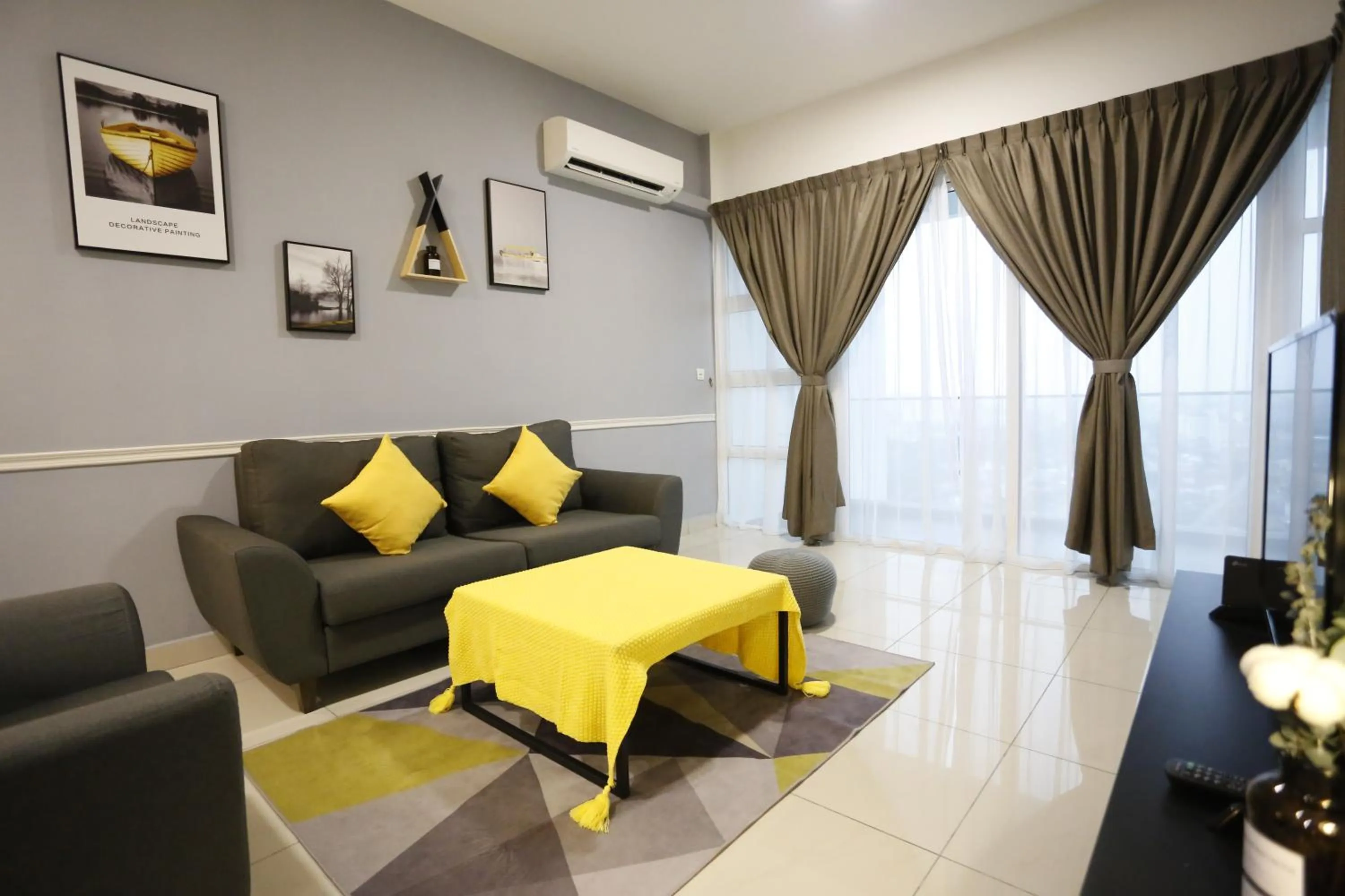 Living room in Pinnacle Tower Homestay by Home Cube