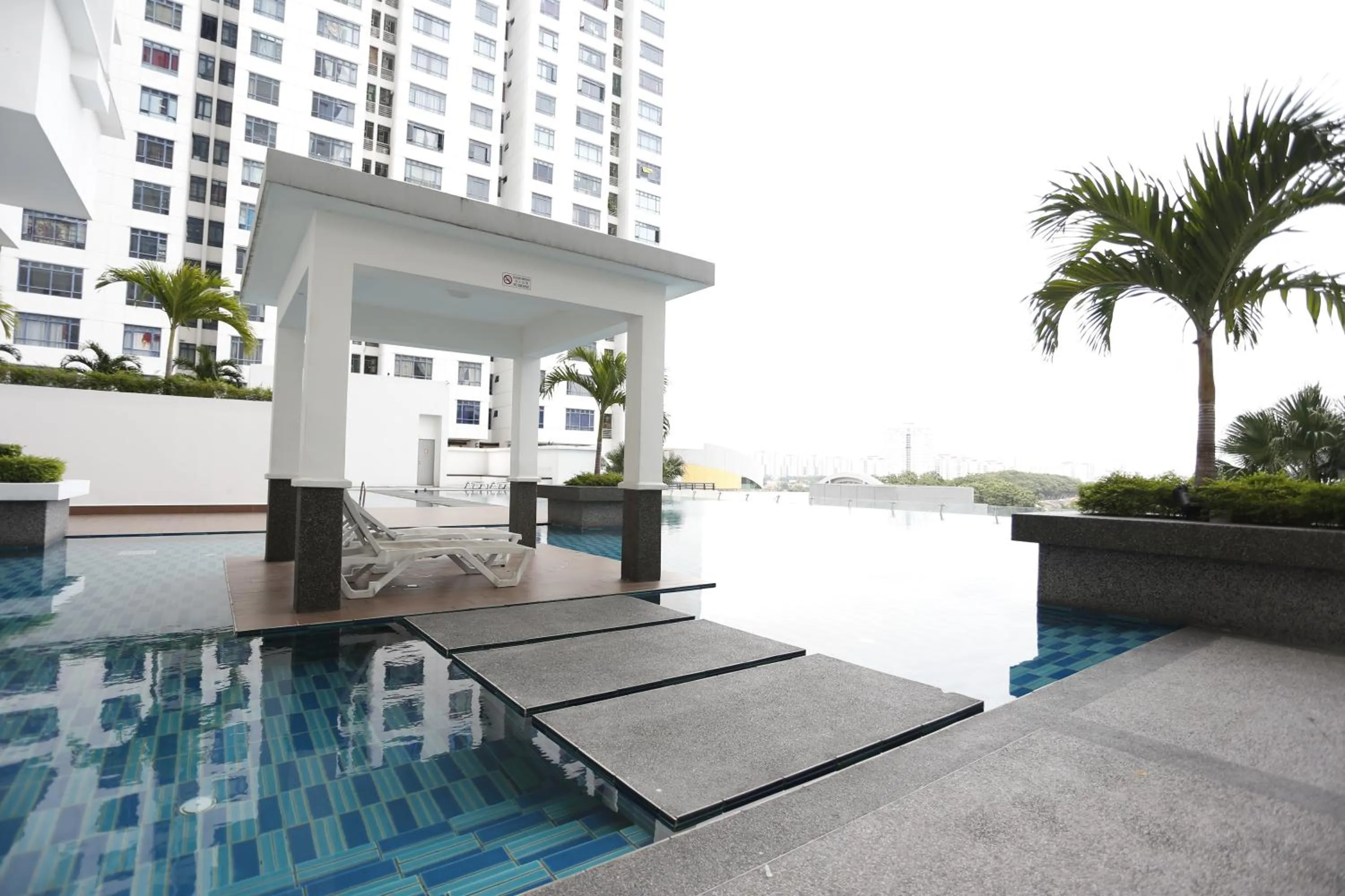 Swimming pool in Pinnacle Tower Homestay by Home Cube