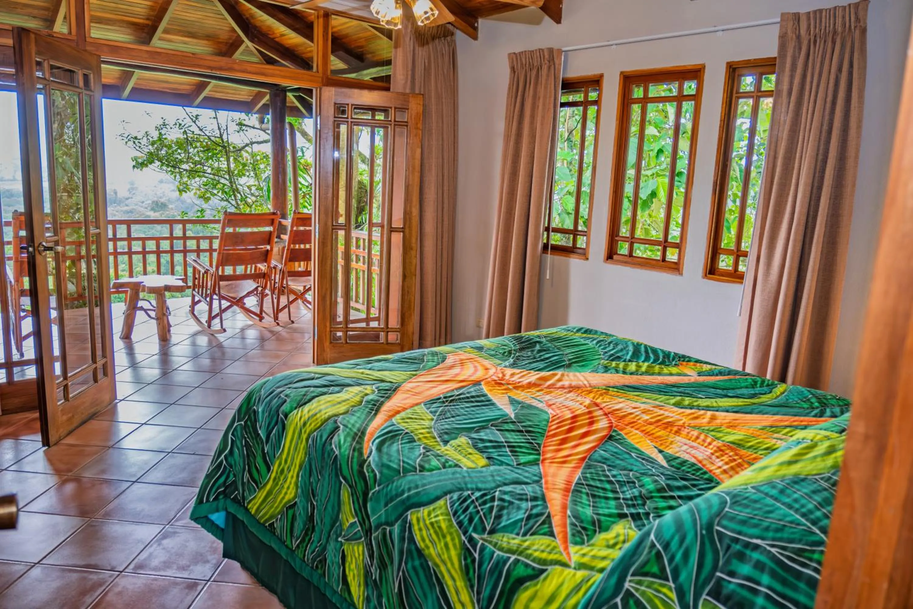 Bed in Lost Iguana Resort and Spa