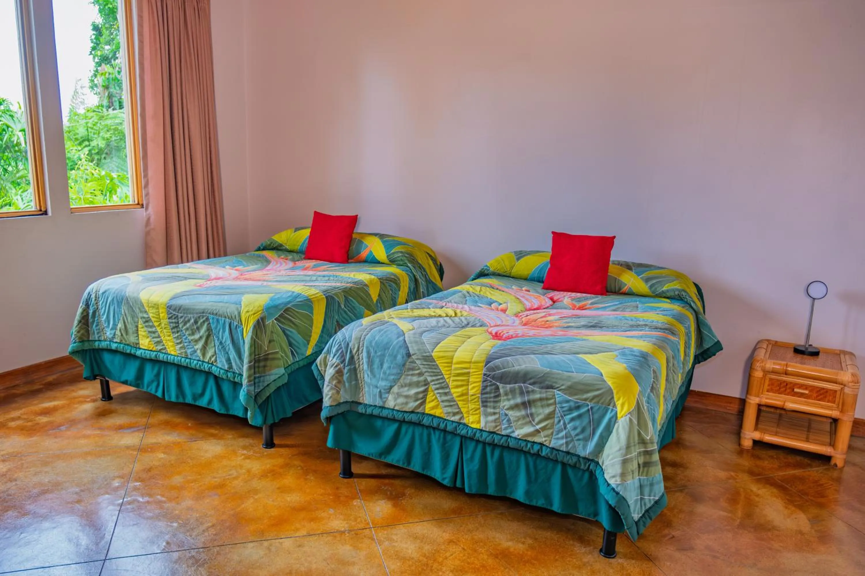 Bed in Lost Iguana Resort and Spa