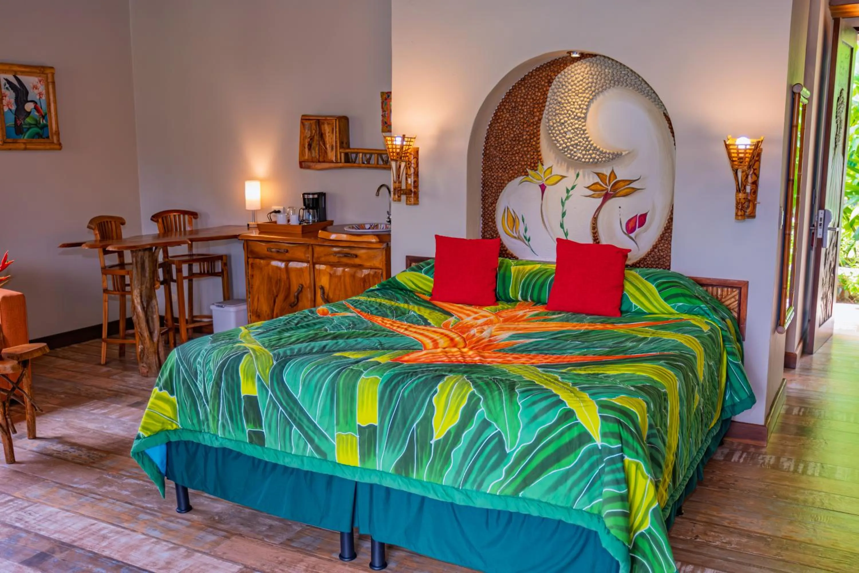 Bed in Lost Iguana Resort and Spa