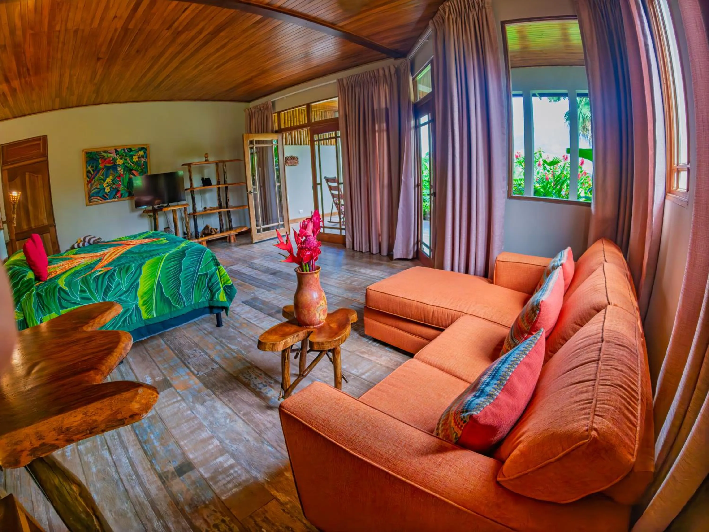 Bed in Lost Iguana Resort and Spa