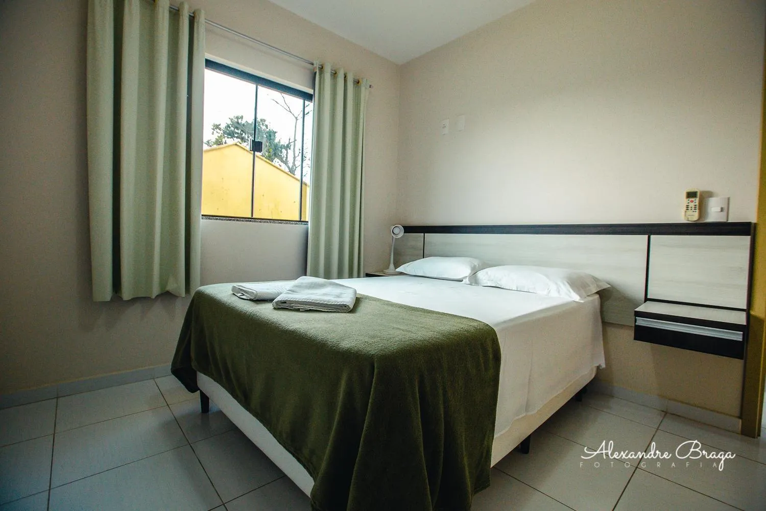 Bed in ApartPousada Residencial dos Reis