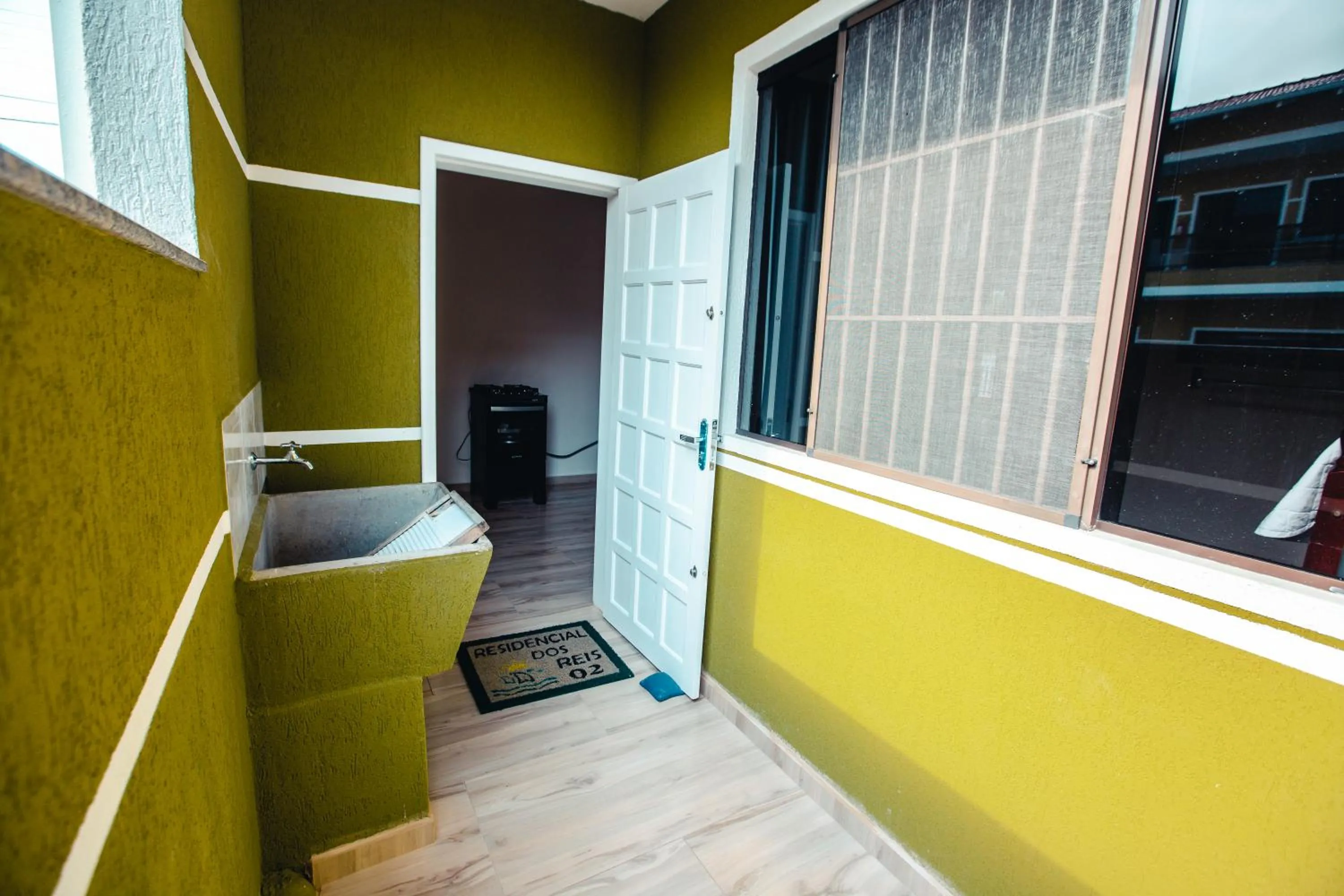 laundry in ApartPousada Residencial dos Reis