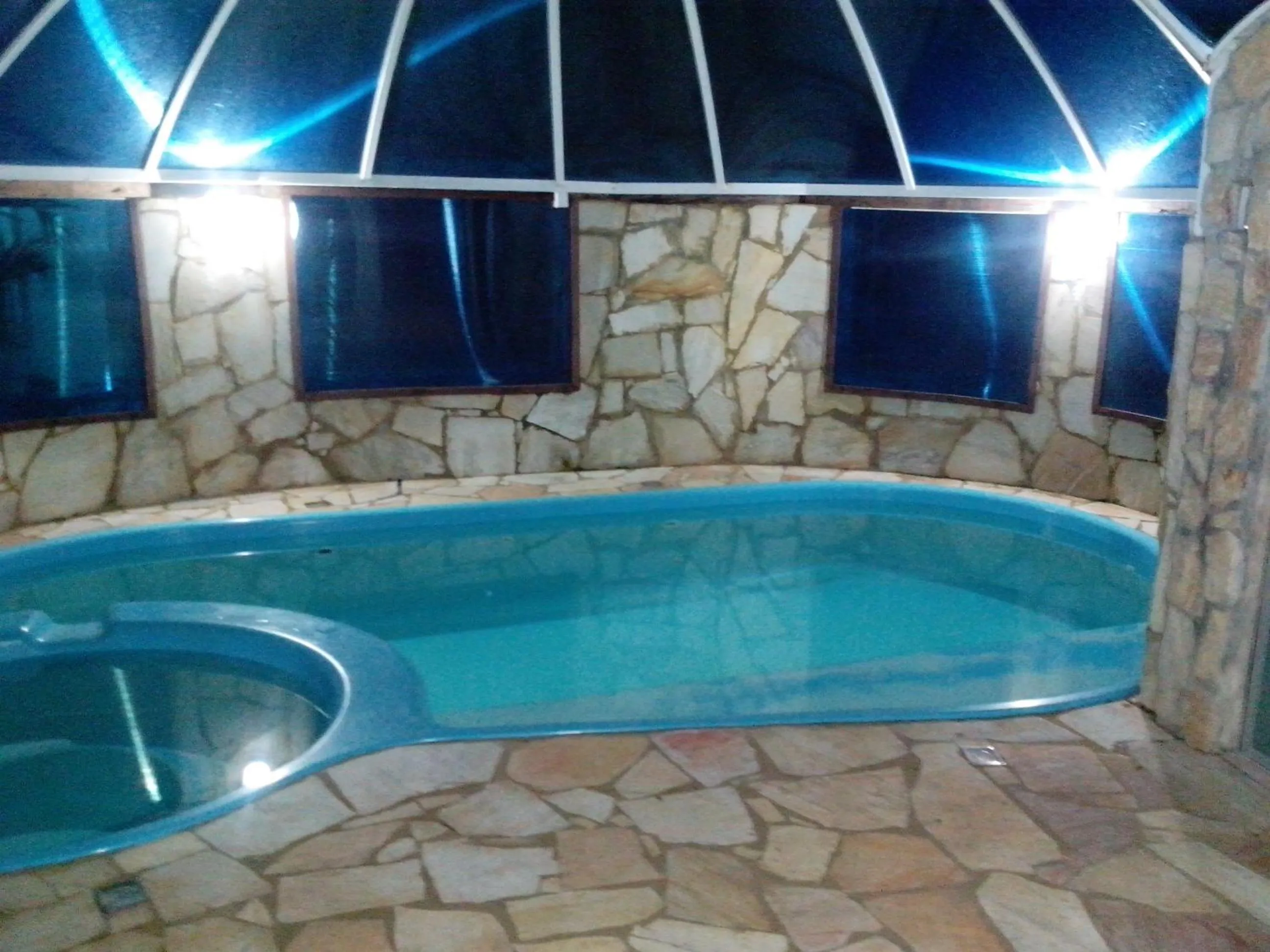 Swimming pool in Pousada Vila D' Itália