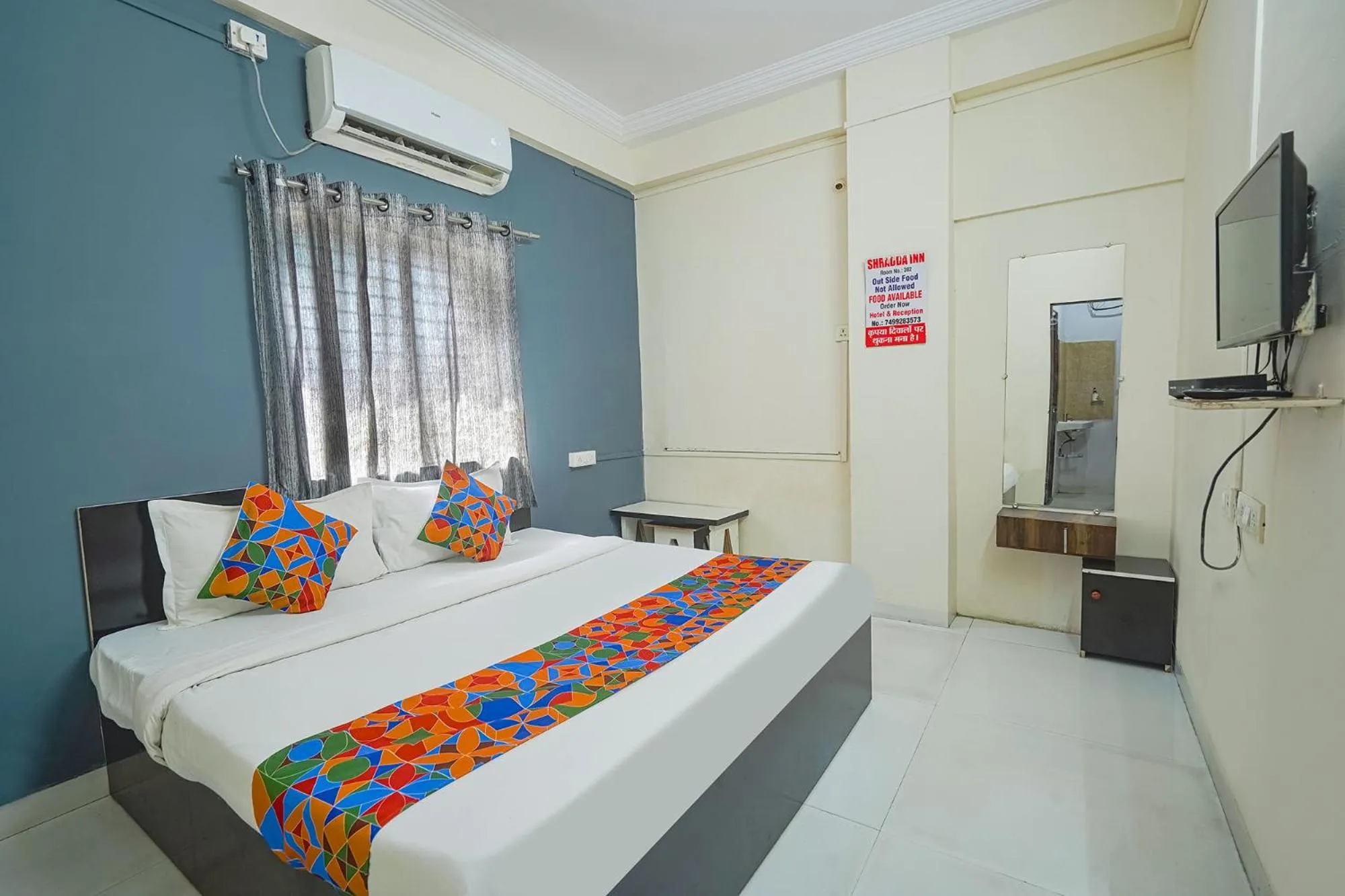 Bed in FabExpress Shraddha inn