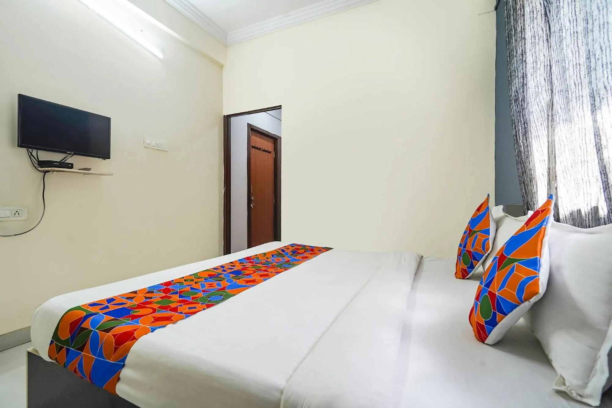 Bed in FabExpress Shraddha inn