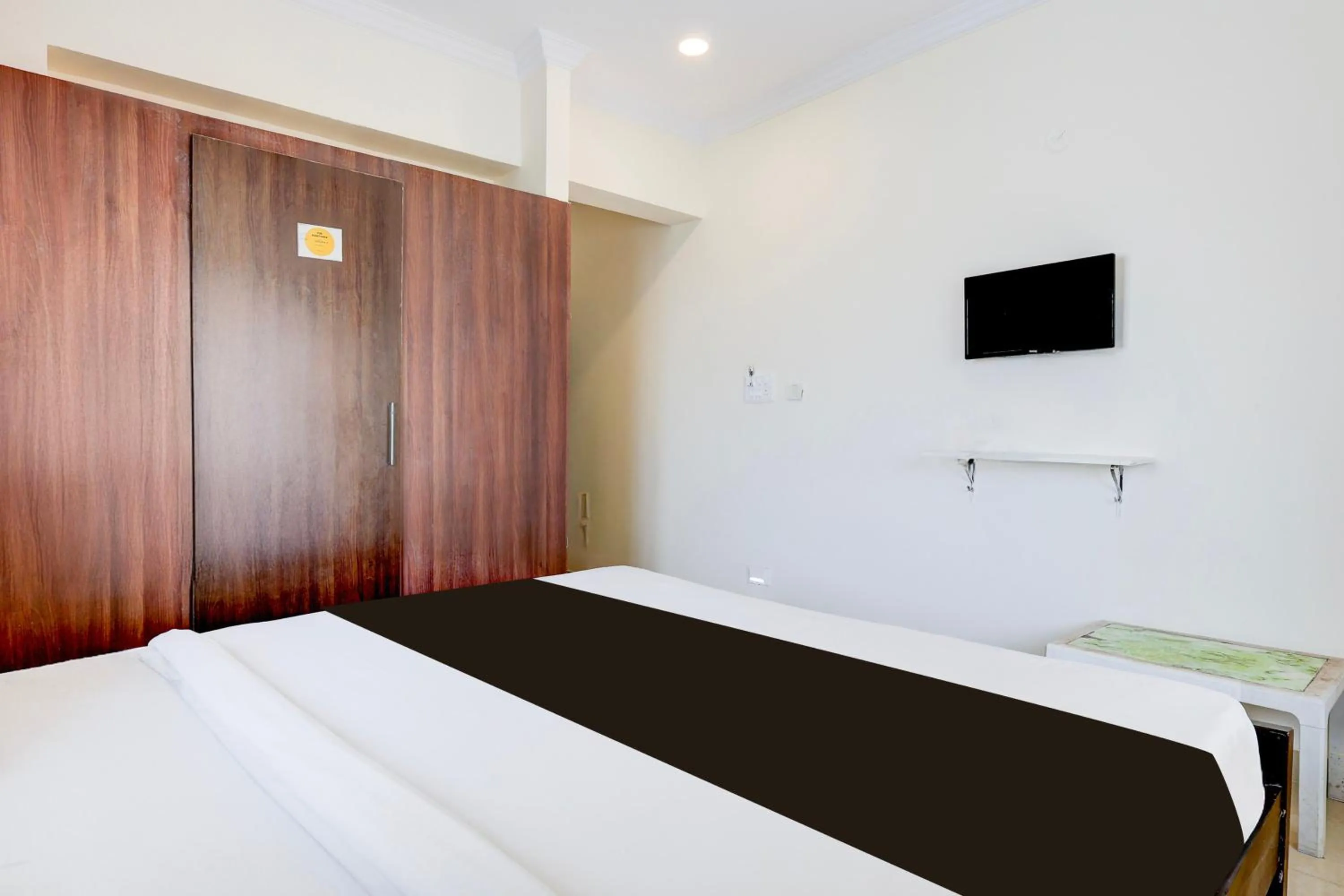 Bedroom, Bed in Super Hotel O Rushikonda Beach