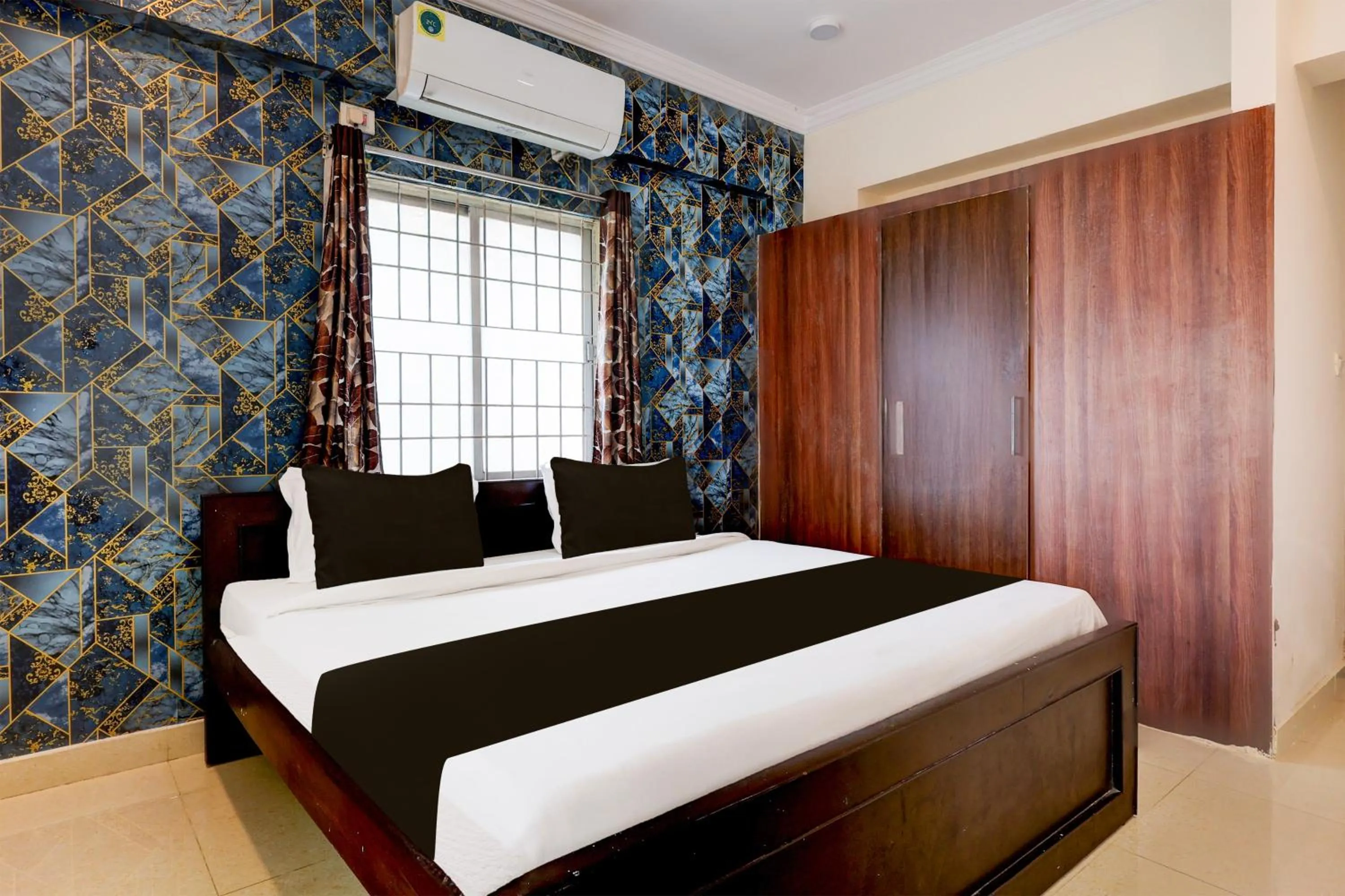 Bedroom, Bed in Super Hotel O Rushikonda Beach