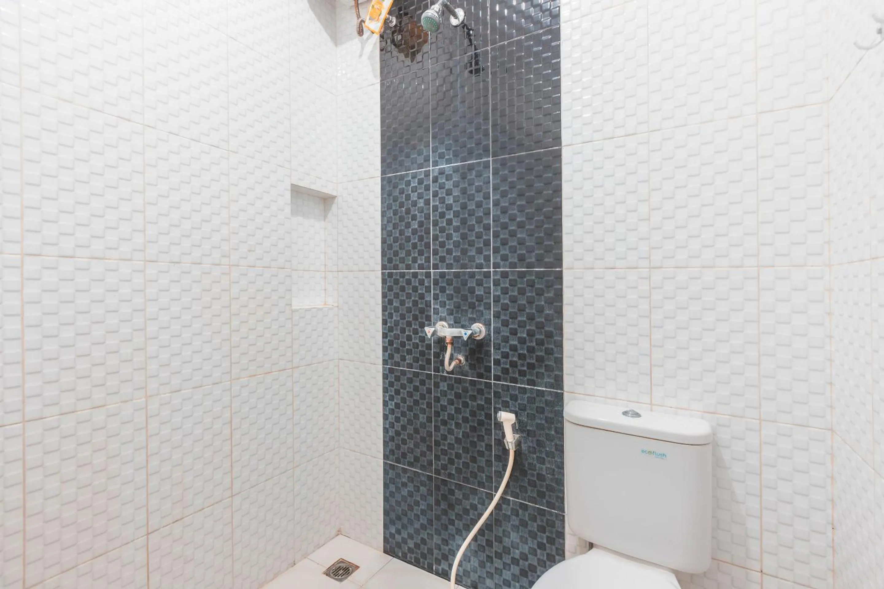 Bathroom in RedDoorz near Universitas Esa Unggul Bekasi Harapan Indah