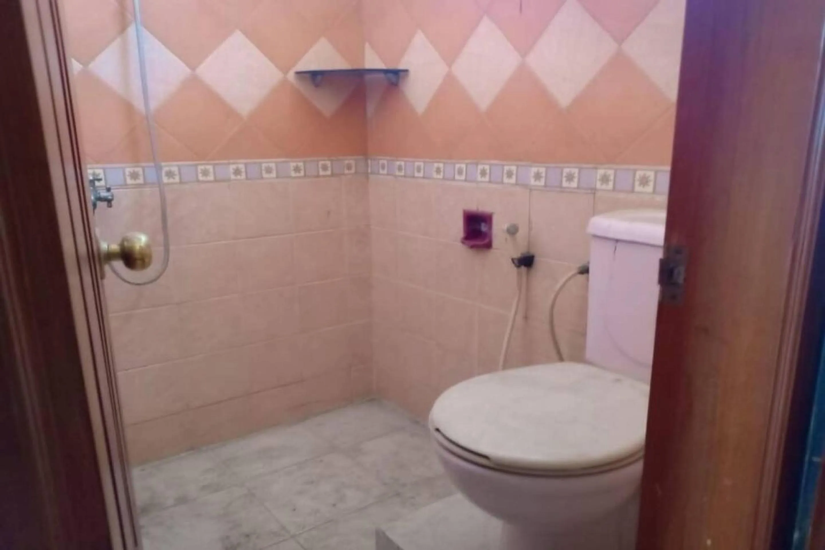 Bathroom in Hotel O Asti Residence 1