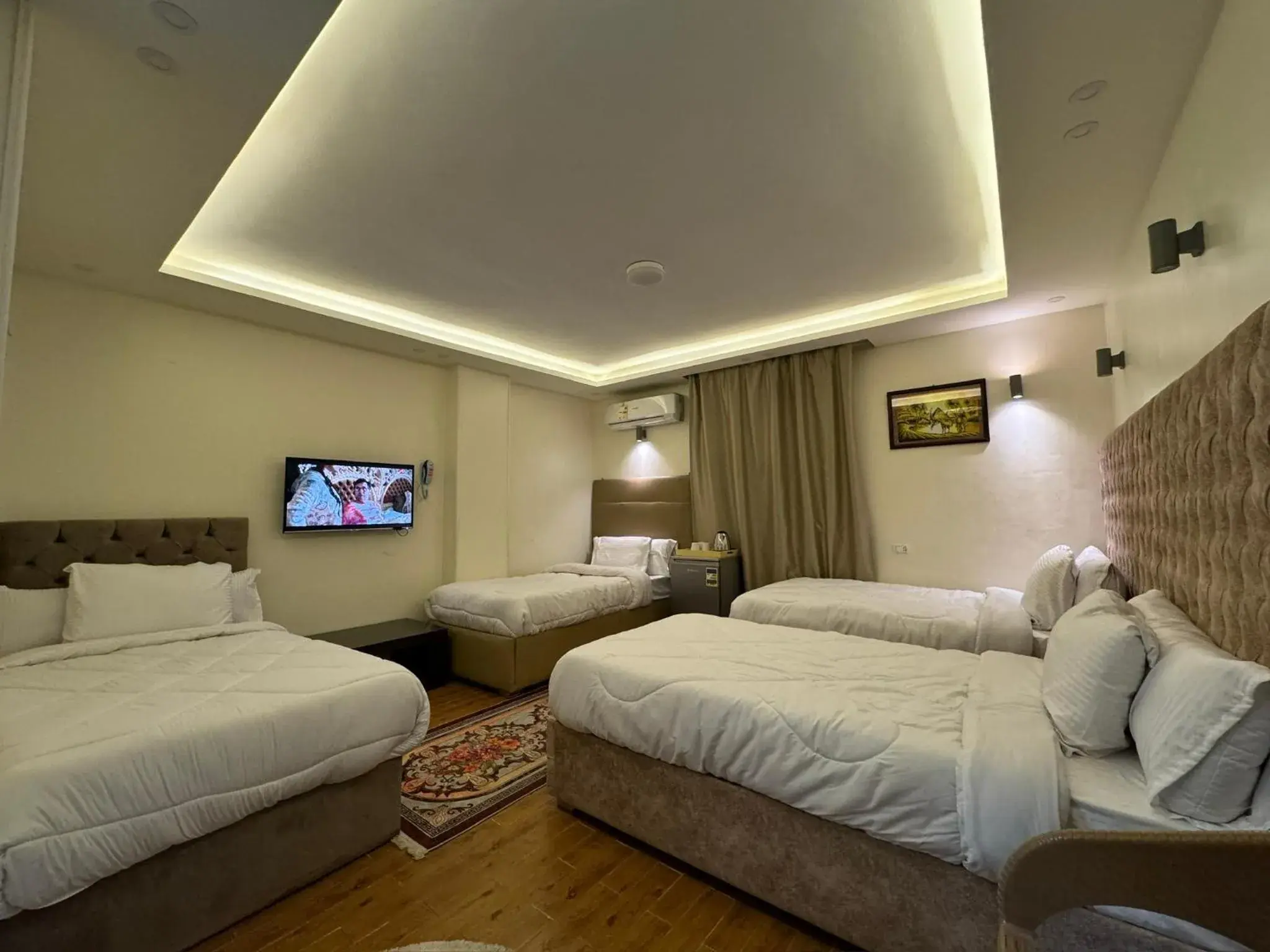 Quadruple Room with Private Bathroom in Pyramids Gardens Hotel Quadruple Room with Private Bathroom in Pyramids Gardens Hotel