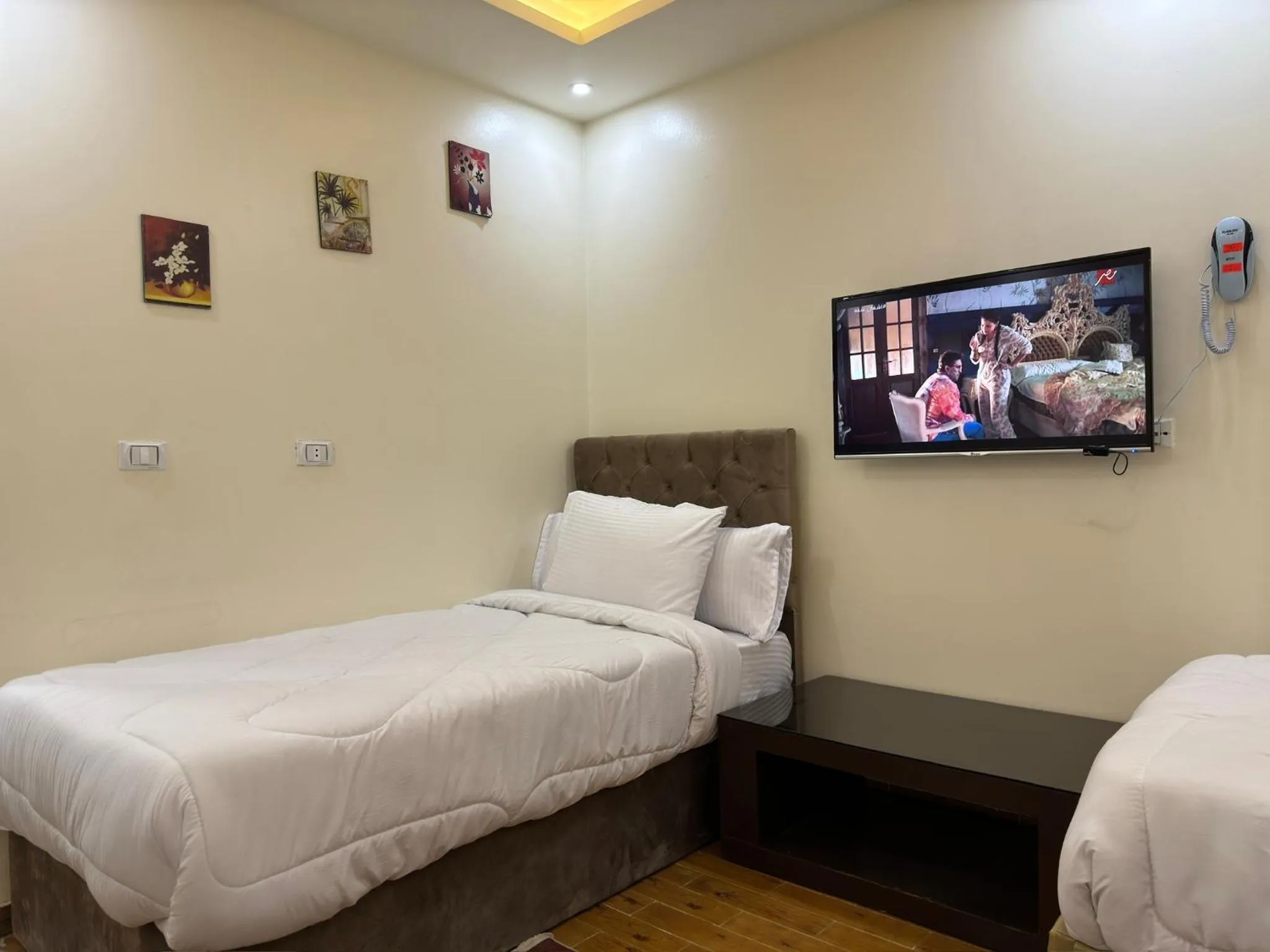 Bed in Pyramids Gardens Hotel