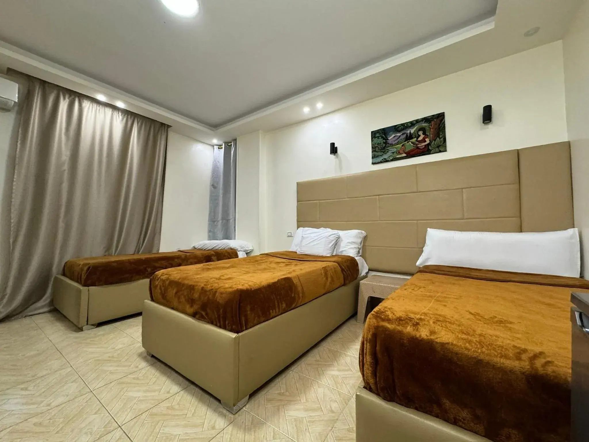 Deluxe Triple Room in Pyramids Gardens Hotel Deluxe Triple Room in Pyramids Gardens Hotel