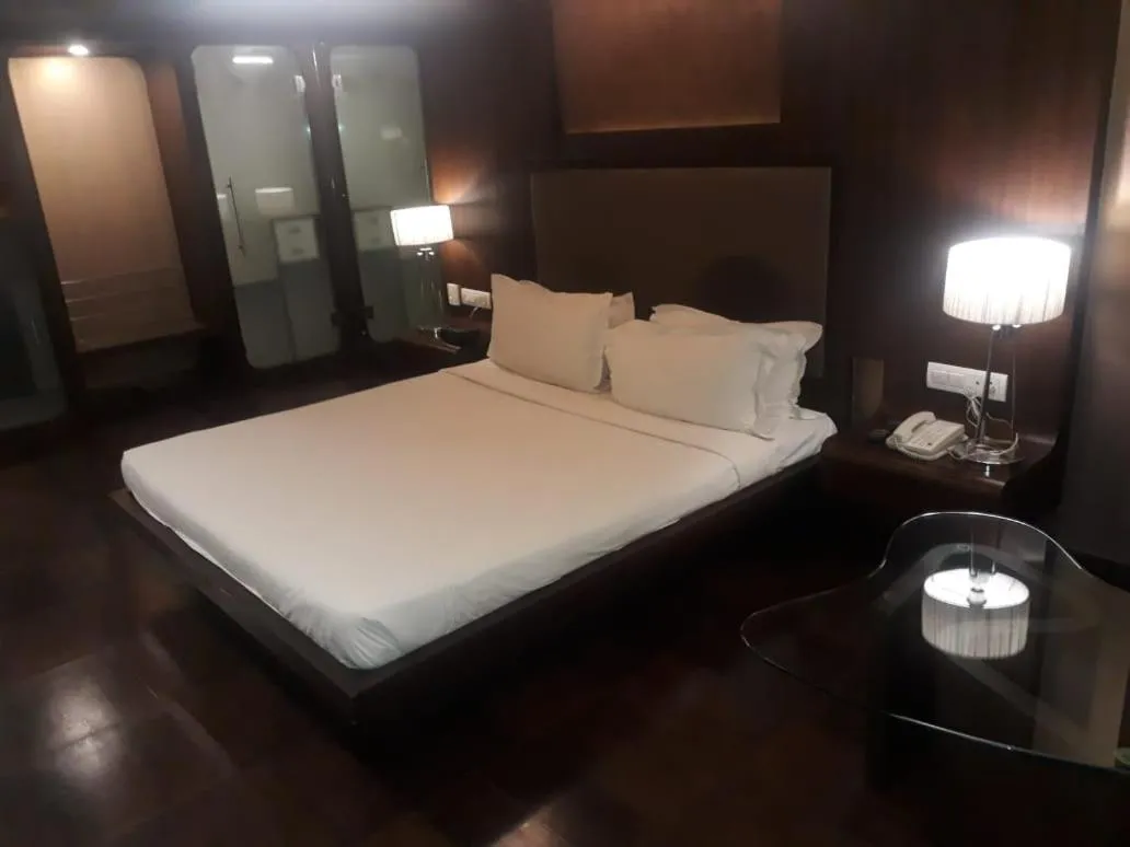 Bed in Cocoon Luxury Business Hotel