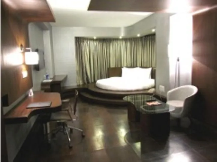 Bed in Cocoon Luxury Business Hotel