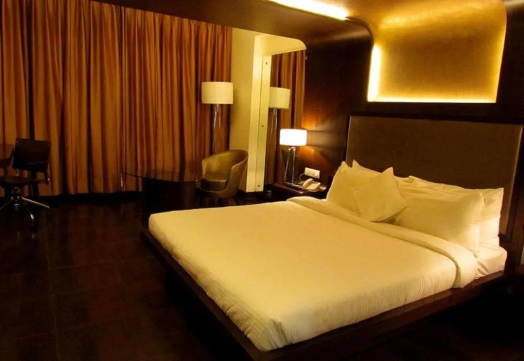 Bed in Cocoon Luxury Business Hotel