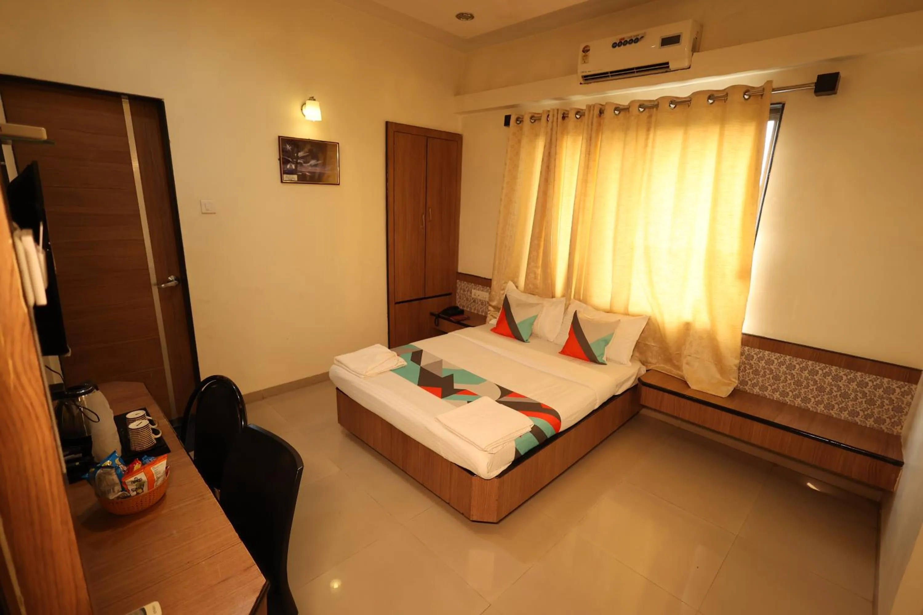 Bed in Hotel Sai Grand Castle Inn