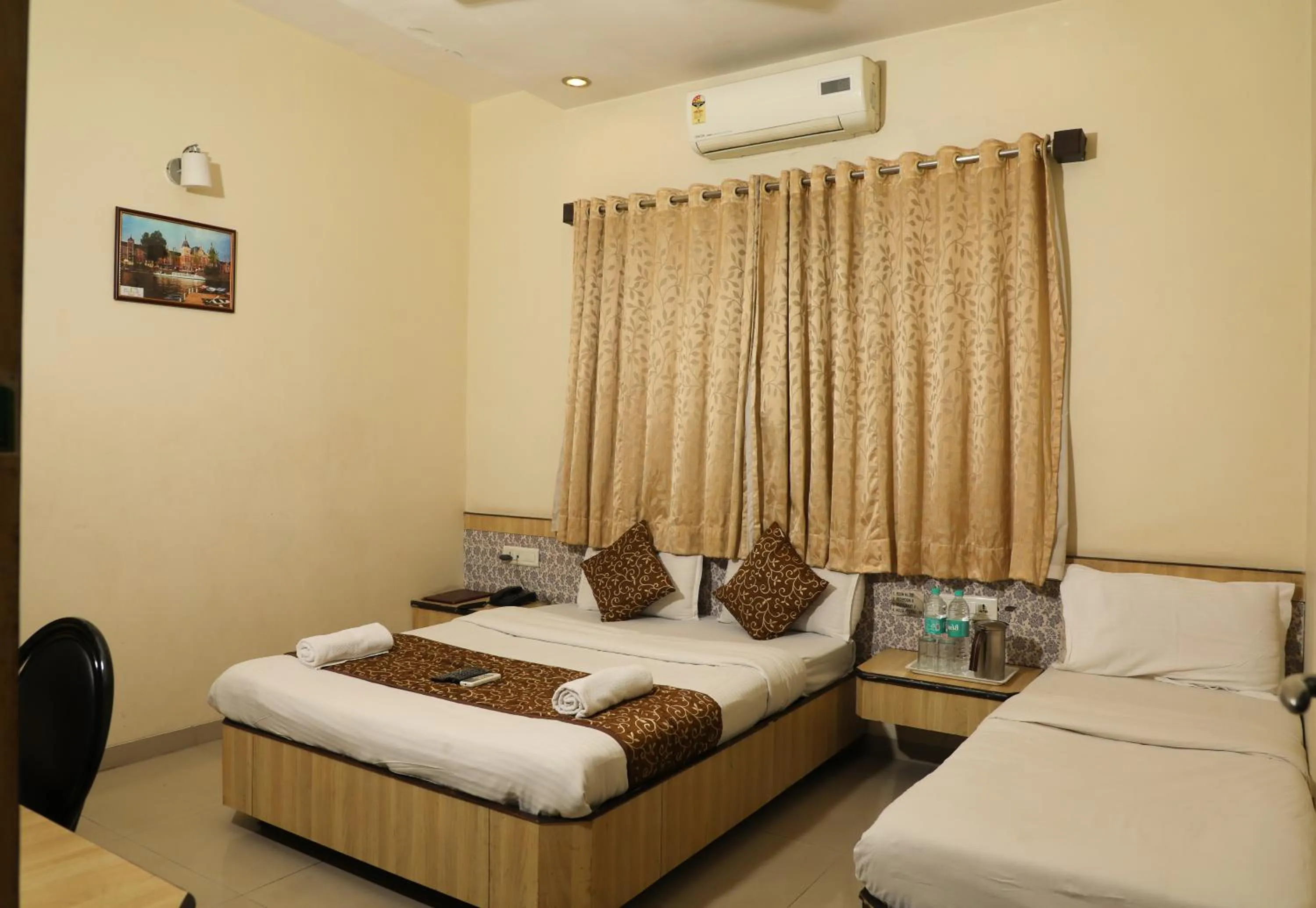 Photo of the whole room, Bed in Hotel Sai Grand Castle Inn