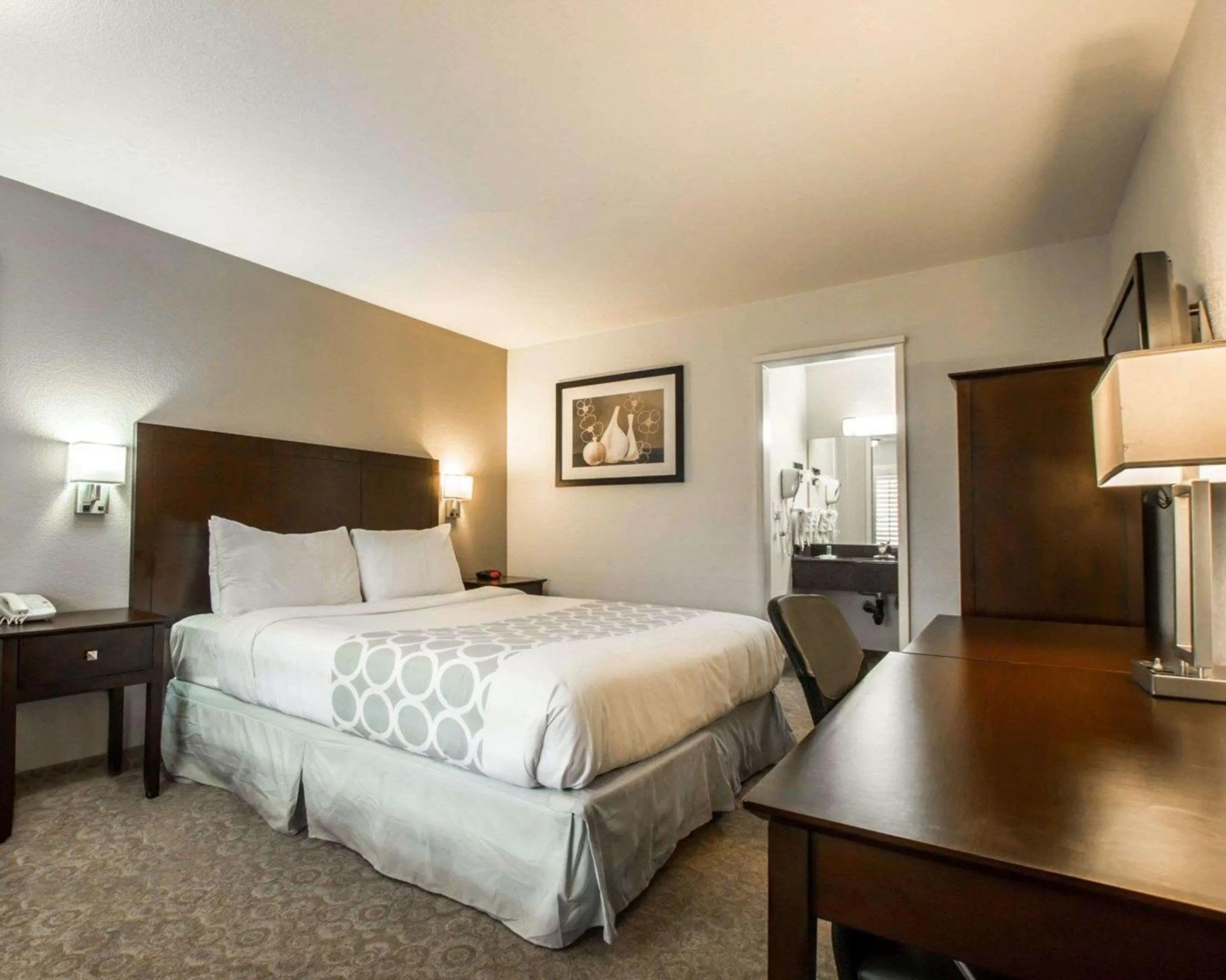 Photo of the whole room, Bed in Rodeway Inn Convention Center