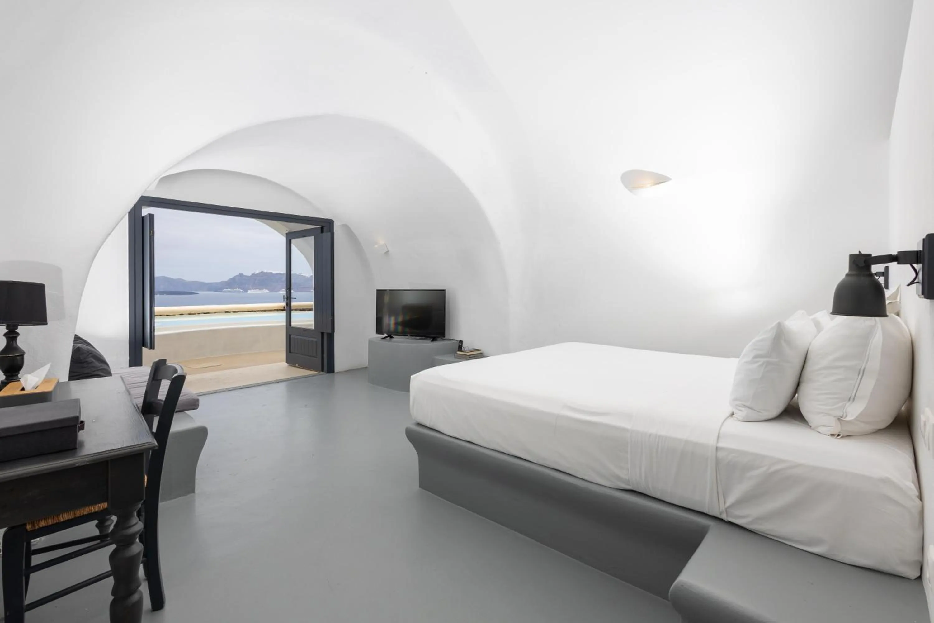 Photo of the whole room, Bed in Grand Ambassador Santorini Hotel