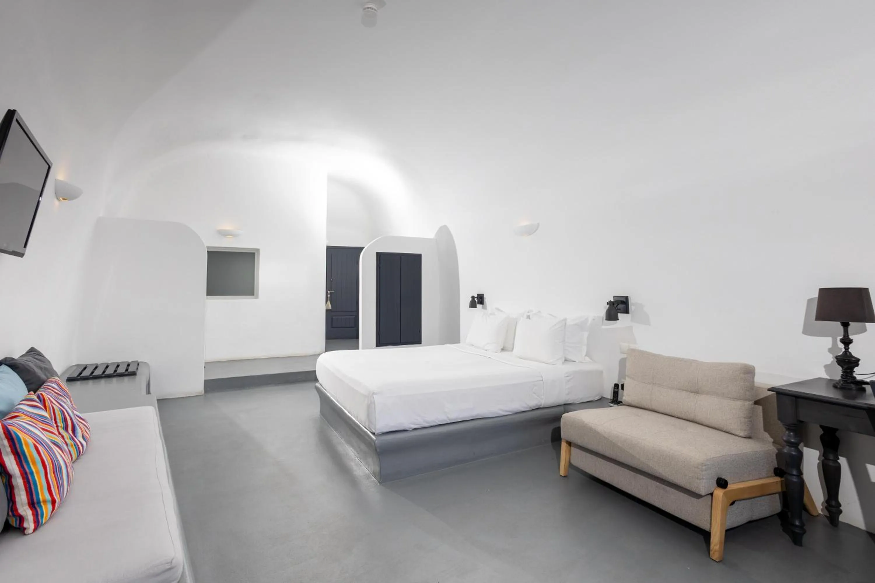 Photo of the whole room, Bed in Grand Ambassador Santorini Hotel