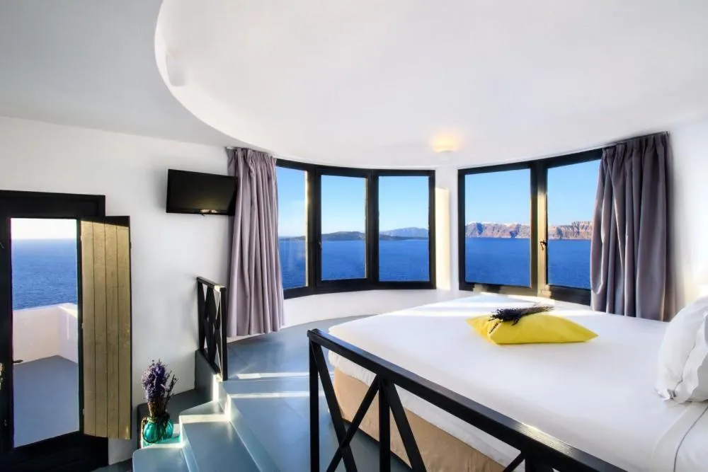 Photo of the whole room, Bed in Grand Ambassador Santorini Hotel