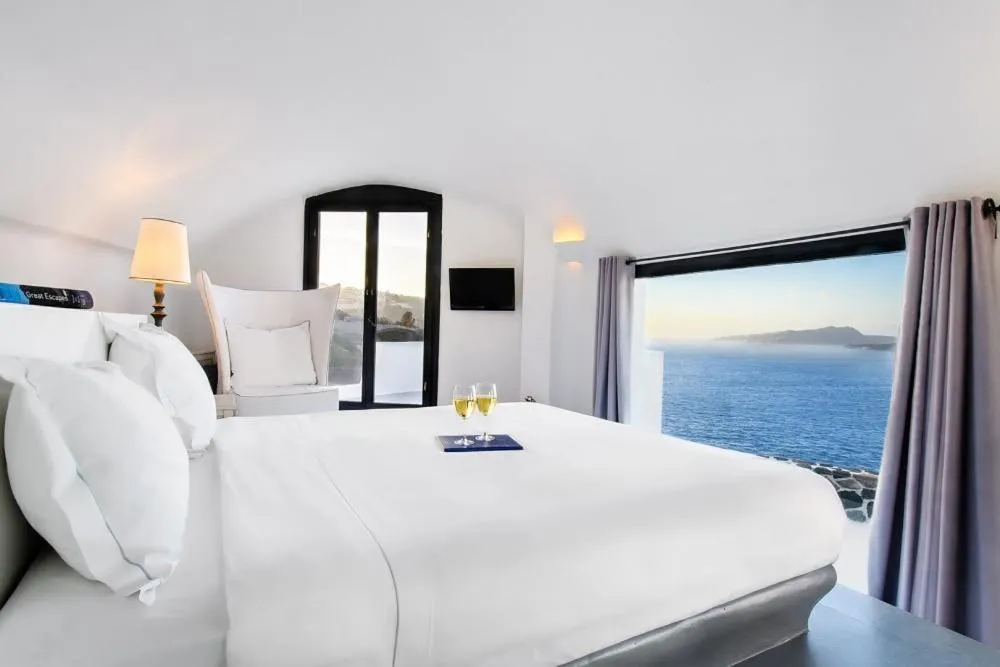 Photo of the whole room, Bed in Grand Ambassador Santorini Hotel
