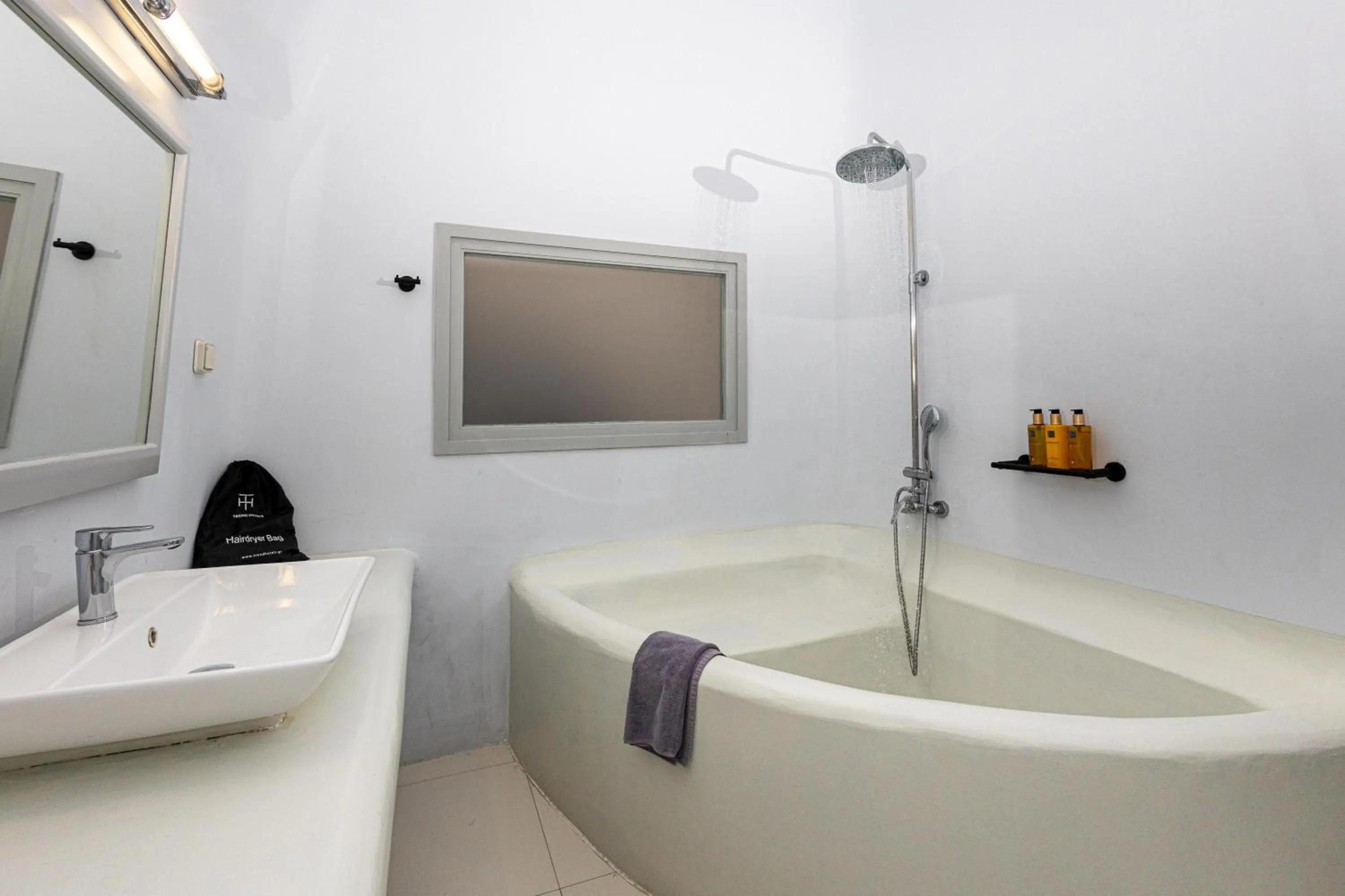 Bathroom in Grand Ambassador Santorini Hotel