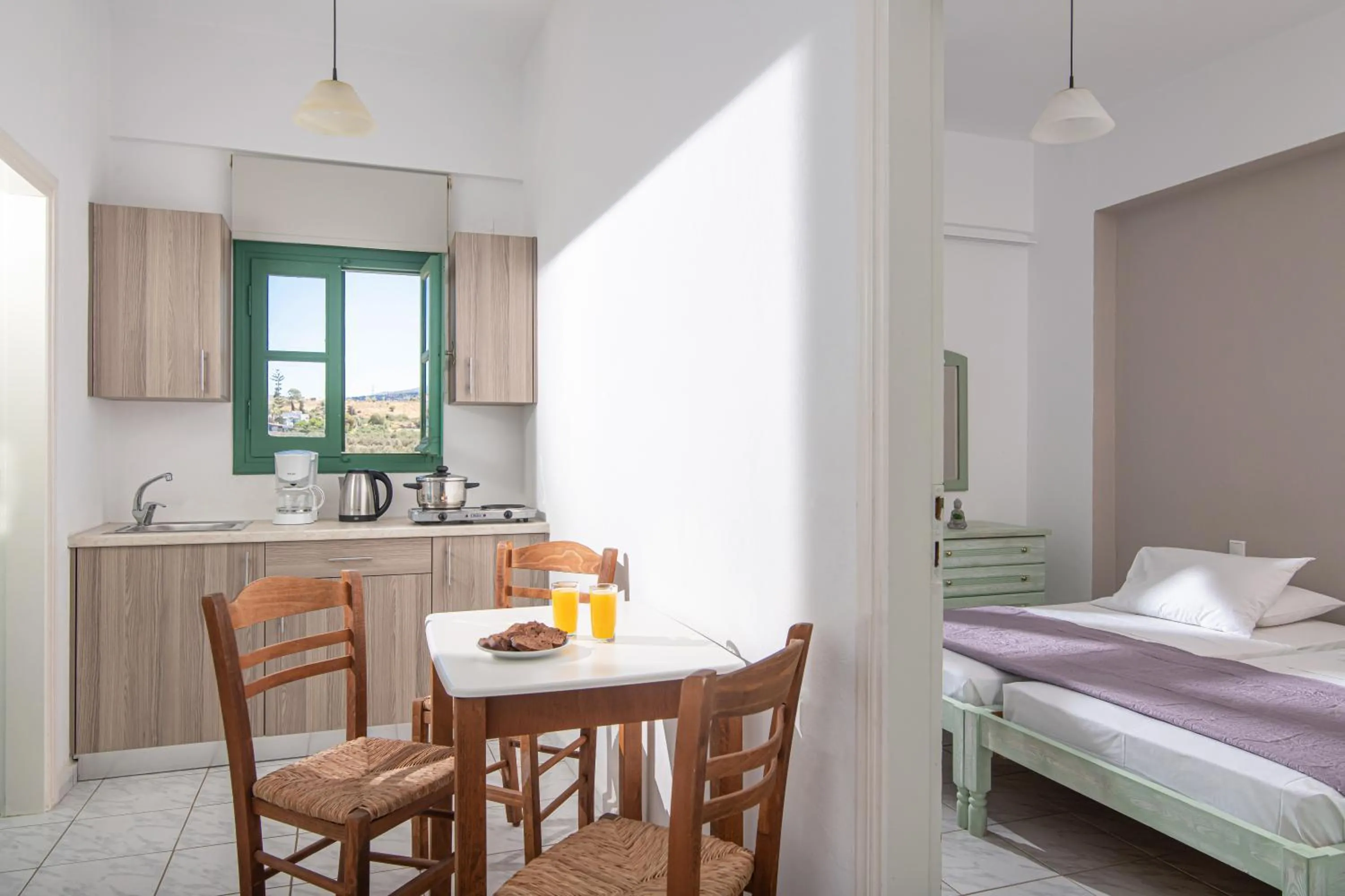 Bed in Portokali Apartments