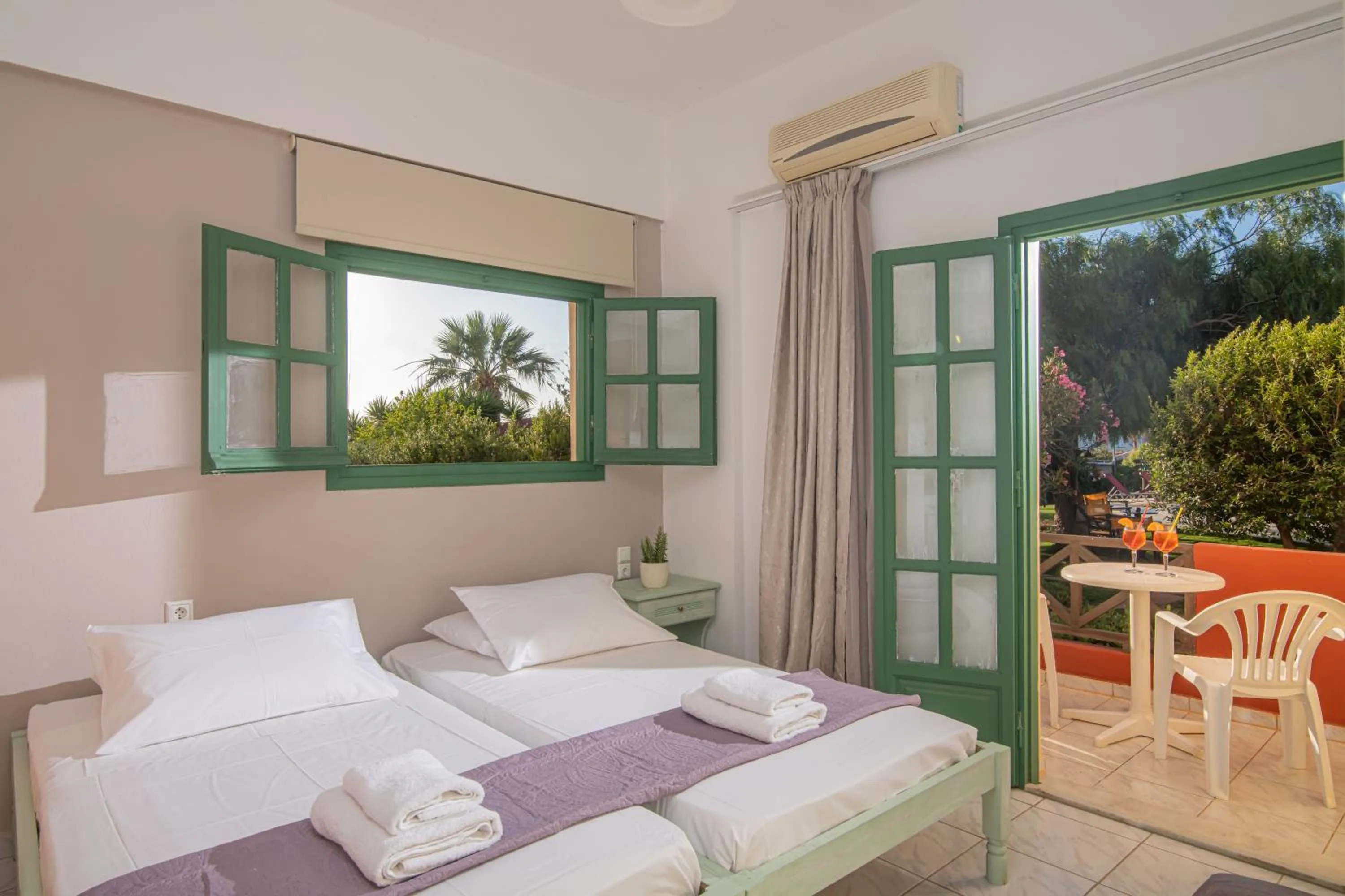 Bed in Portokali Apartments