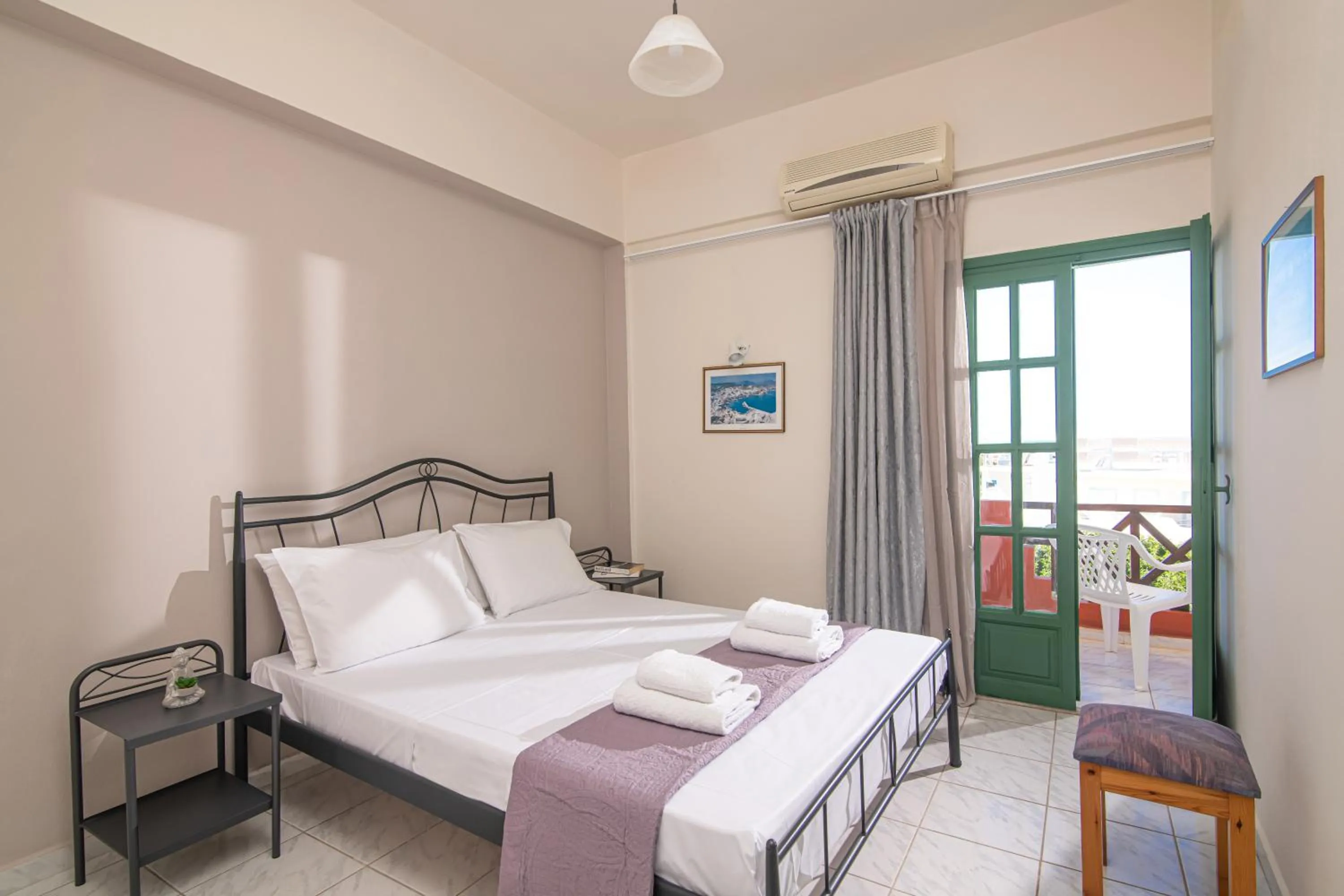 Bed in Portokali Apartments