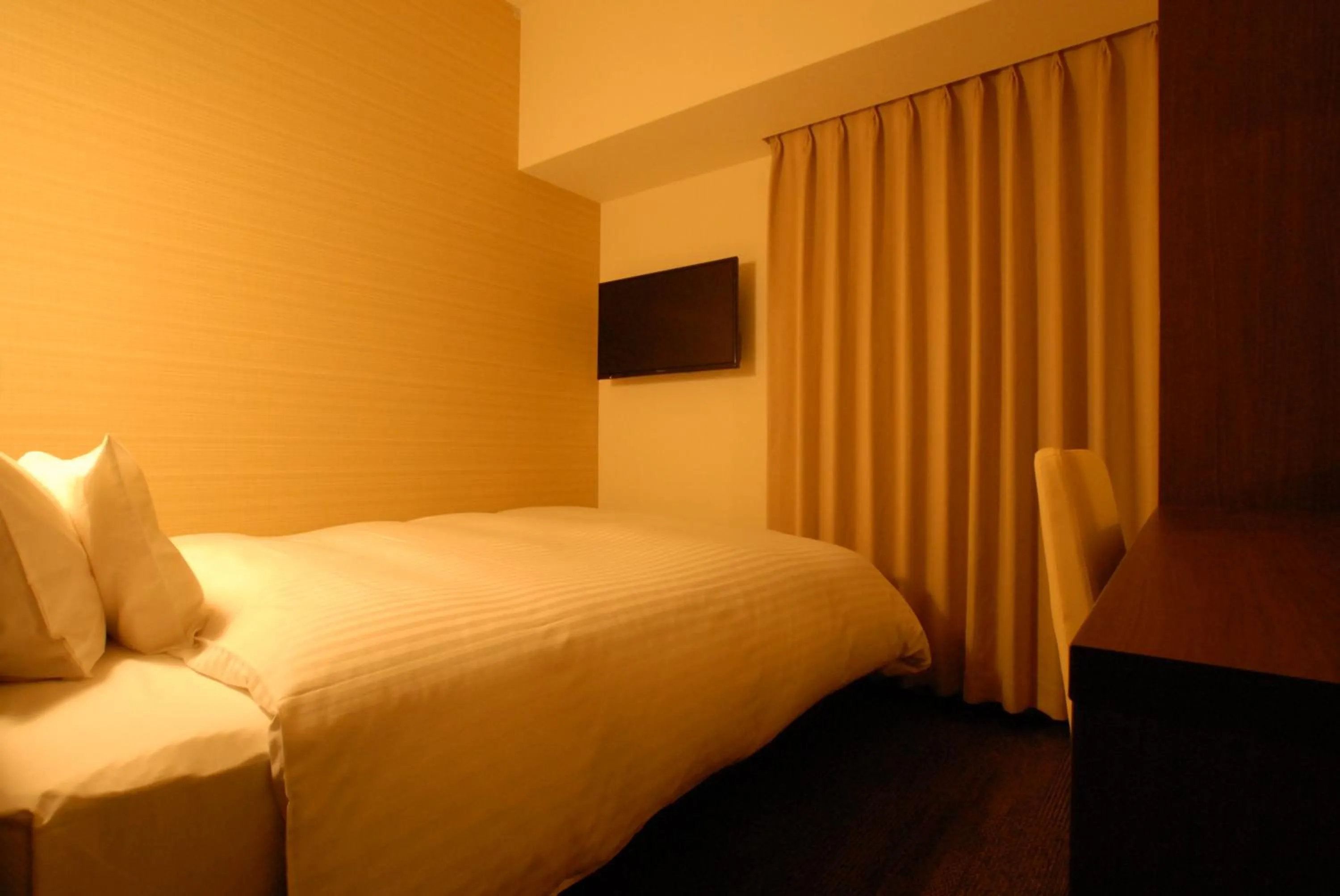 Bed in AB Hotel Iwata