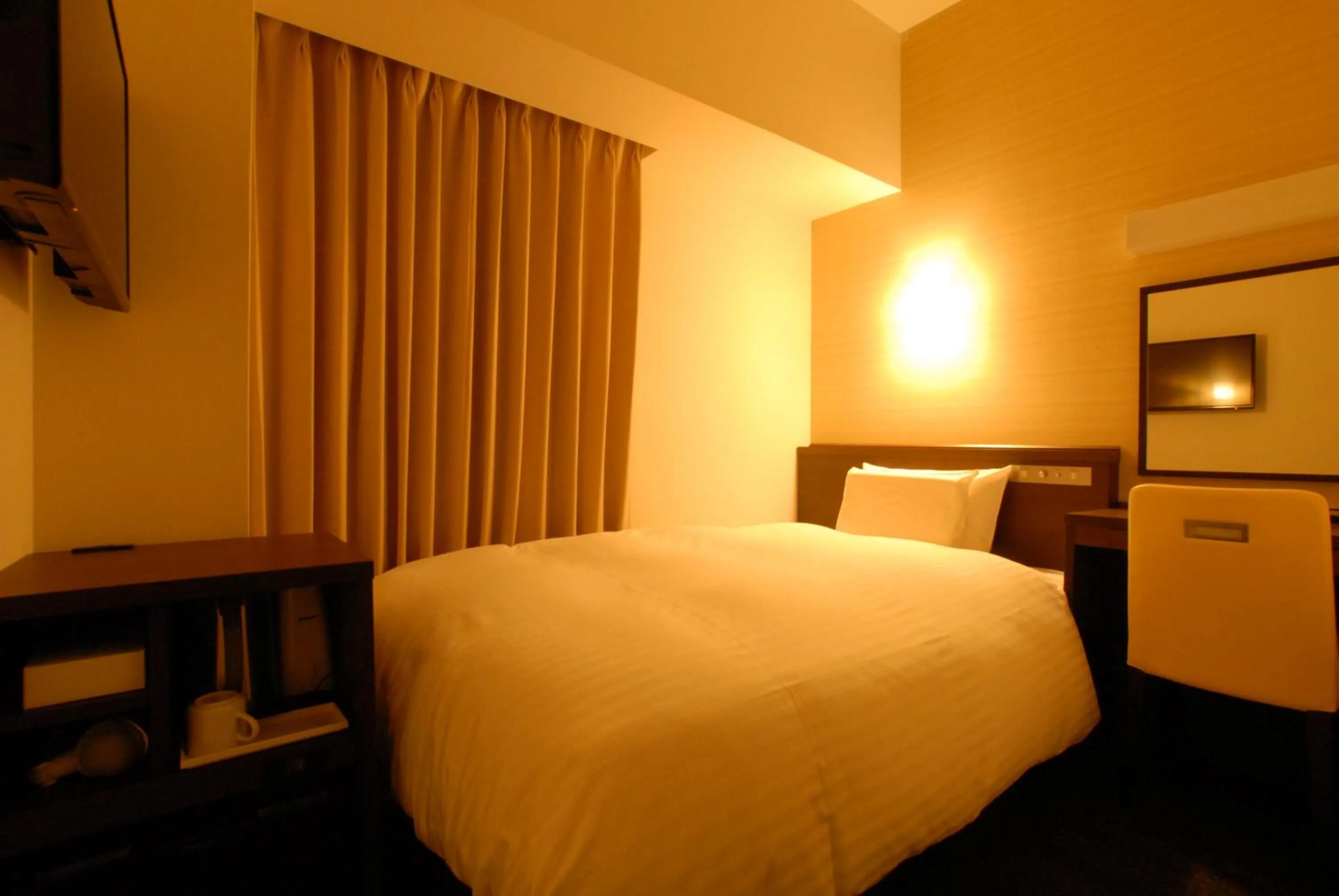 Bed in AB Hotel Iwata