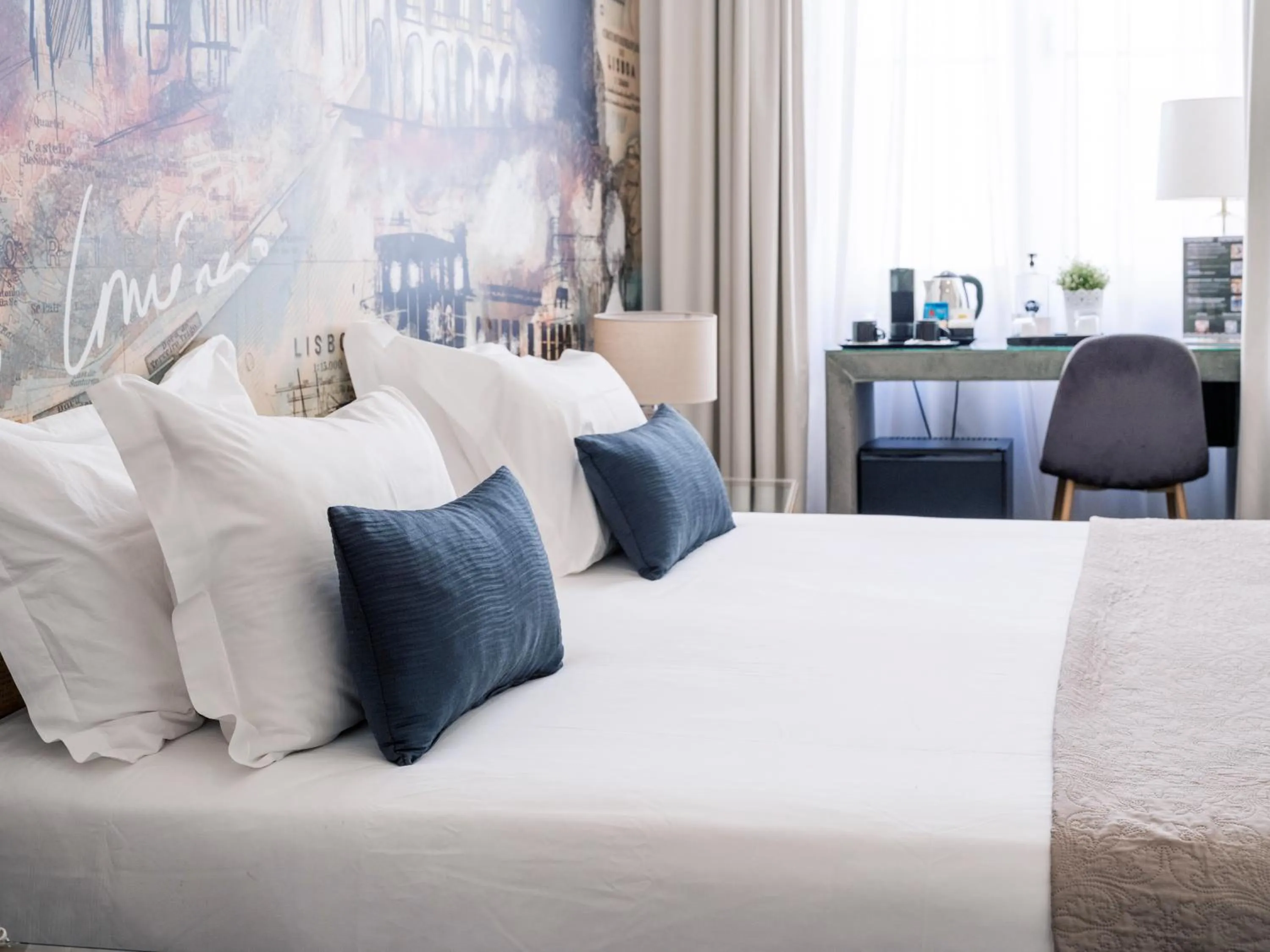 Bed in The ART INN Lisbon