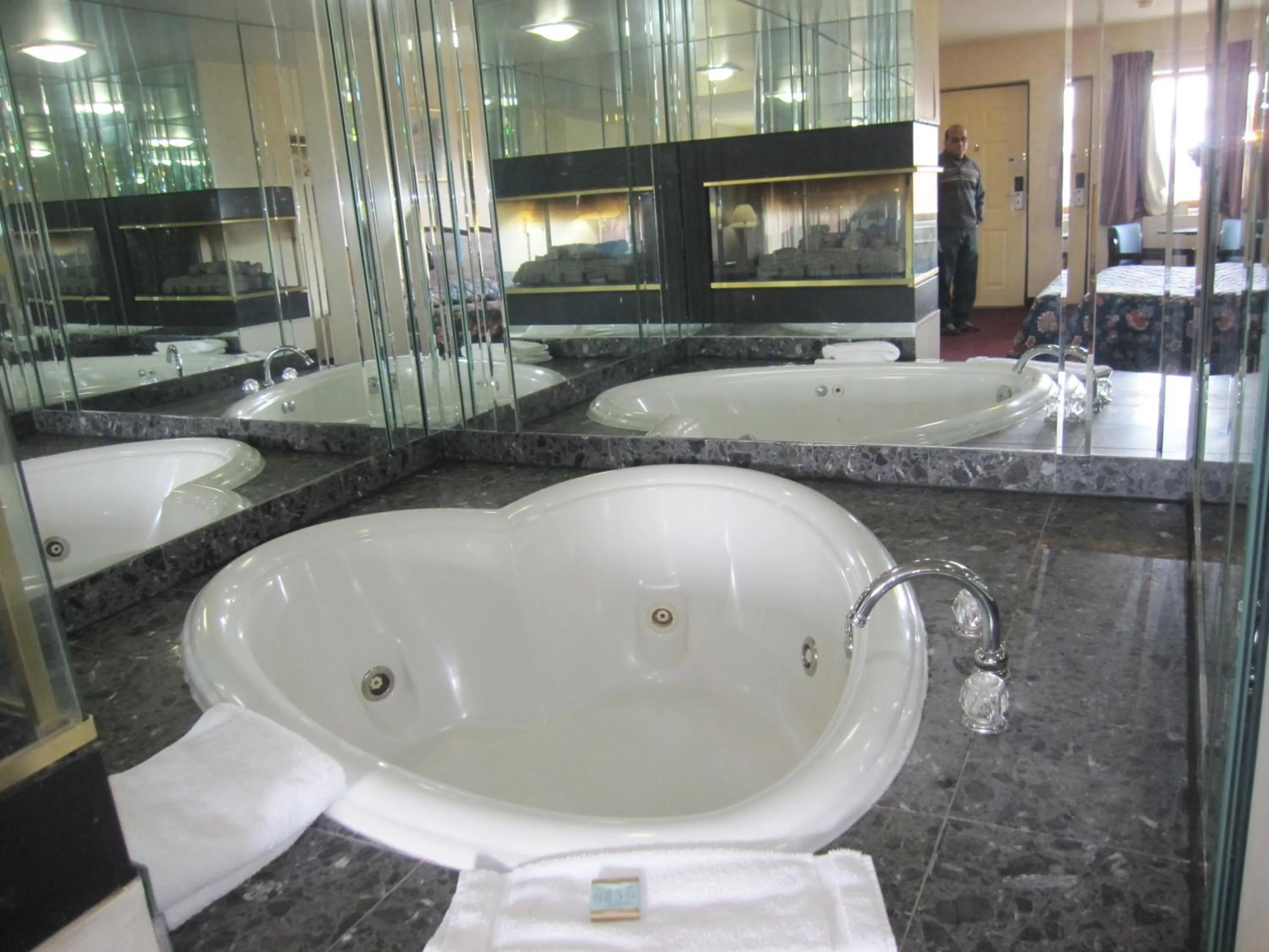 Bathroom in Travelodge by Wyndham Niagara Falls - New York