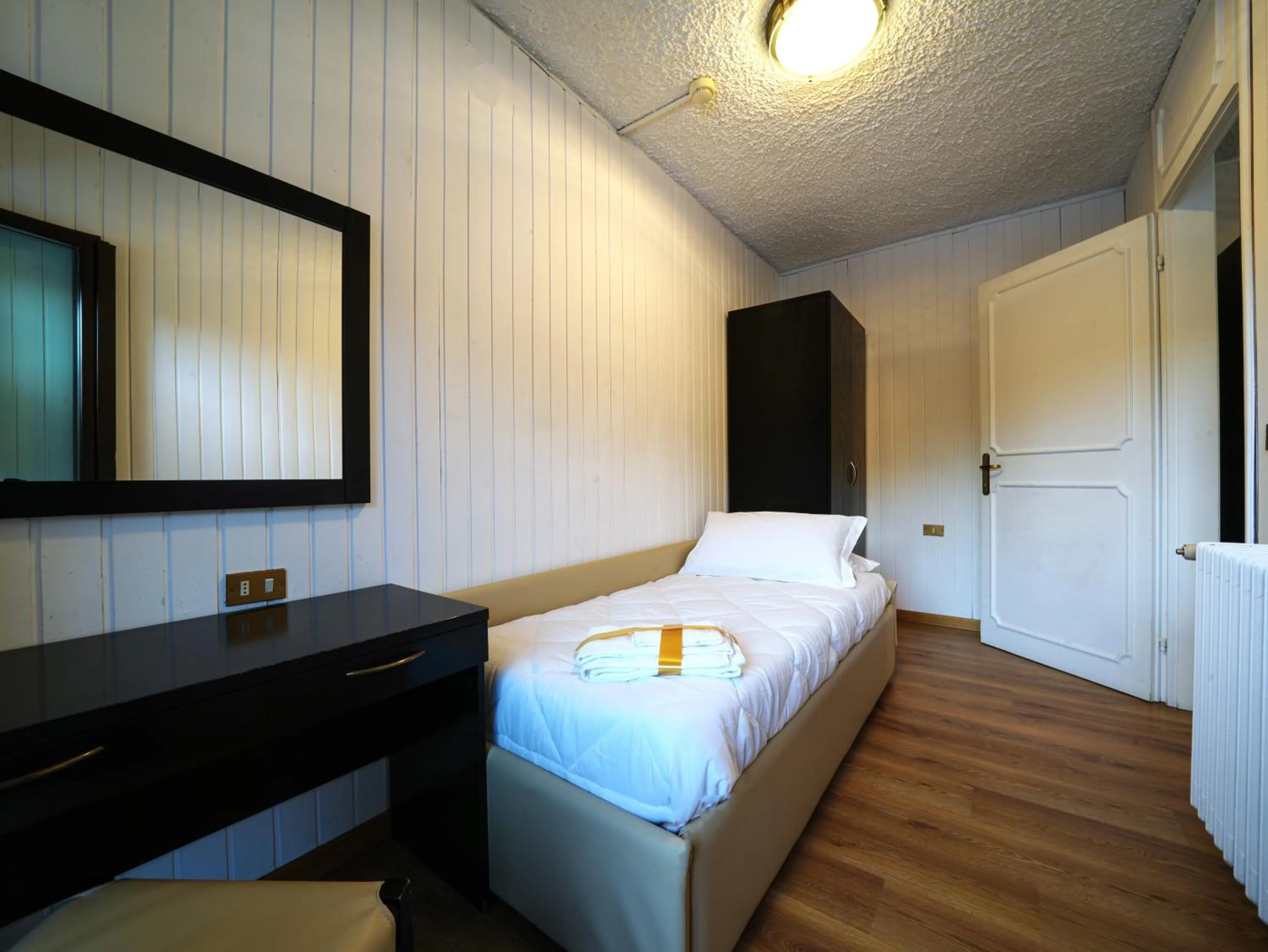 Bed in Hotel Arlecchino - Dada Hotels