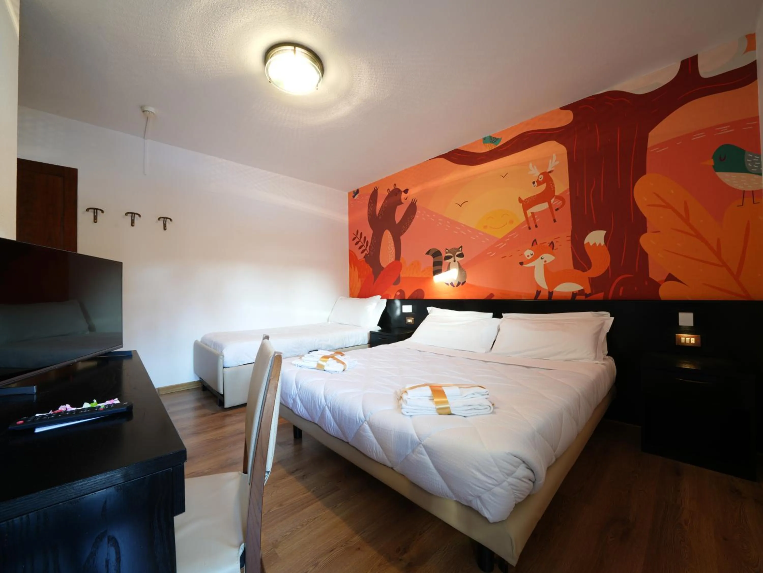 Bed in Hotel Arlecchino - Dada Hotels