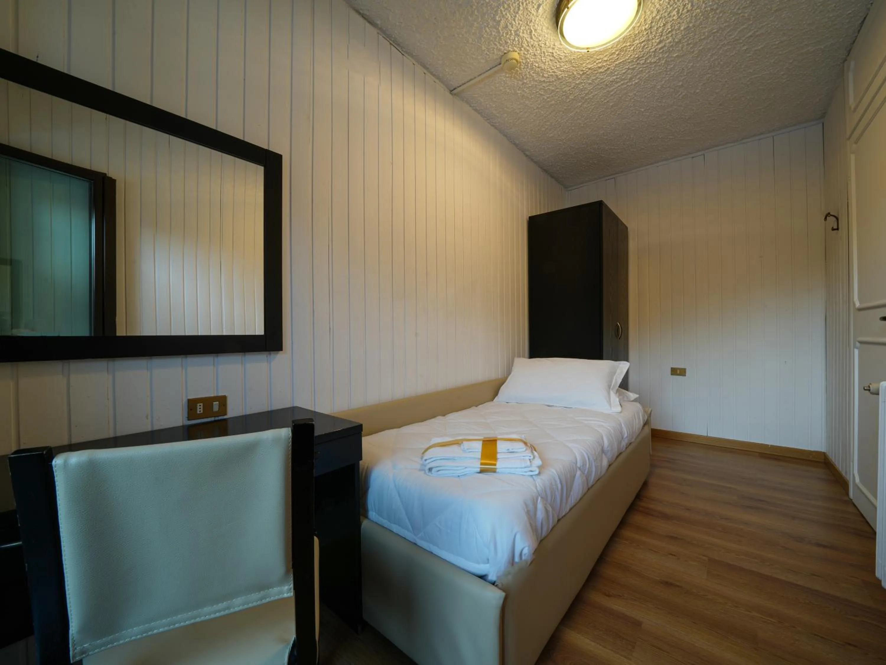 Bed in Hotel Arlecchino - Dada Hotels