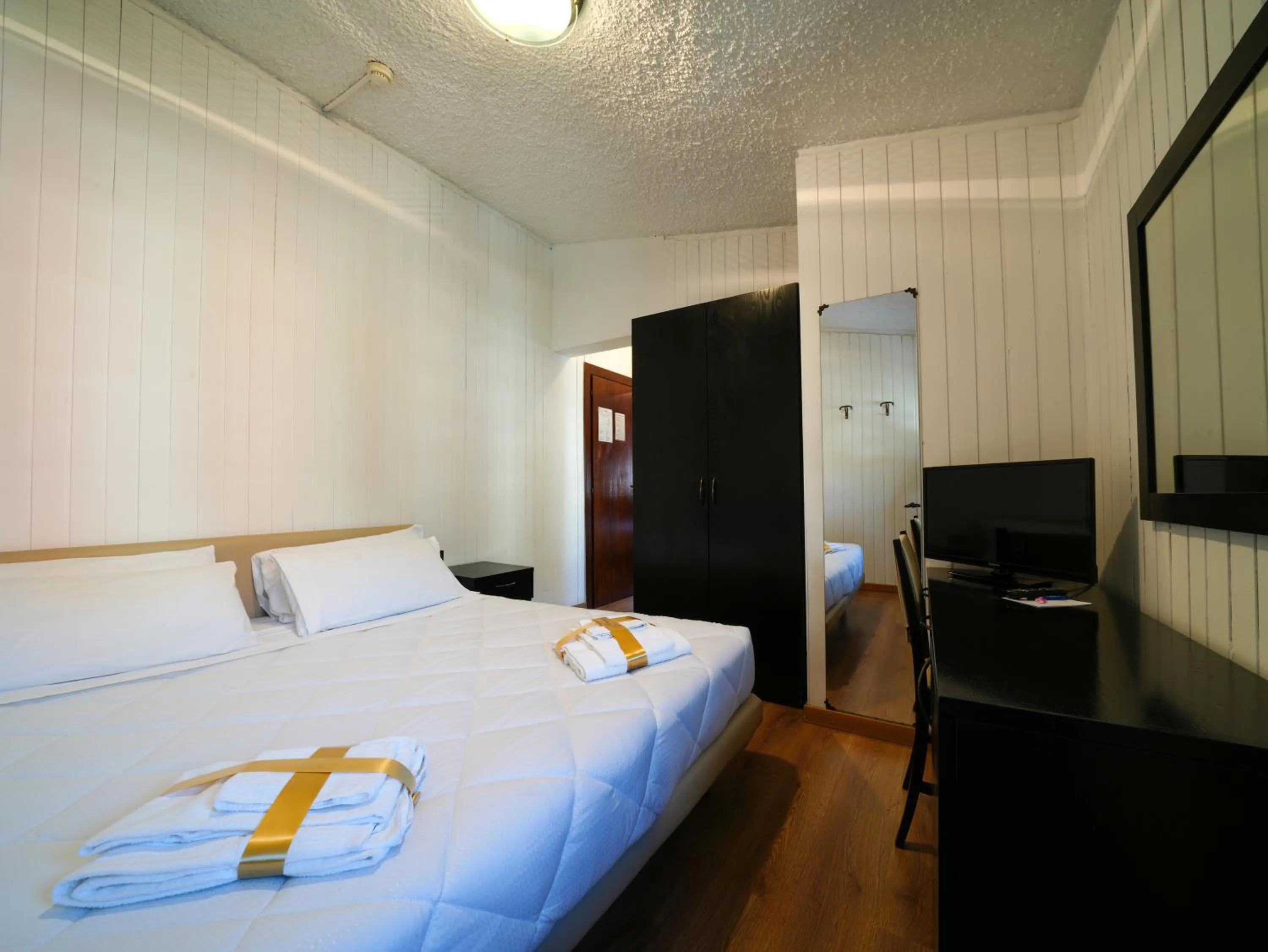 Bed in Hotel Arlecchino - Dada Hotels