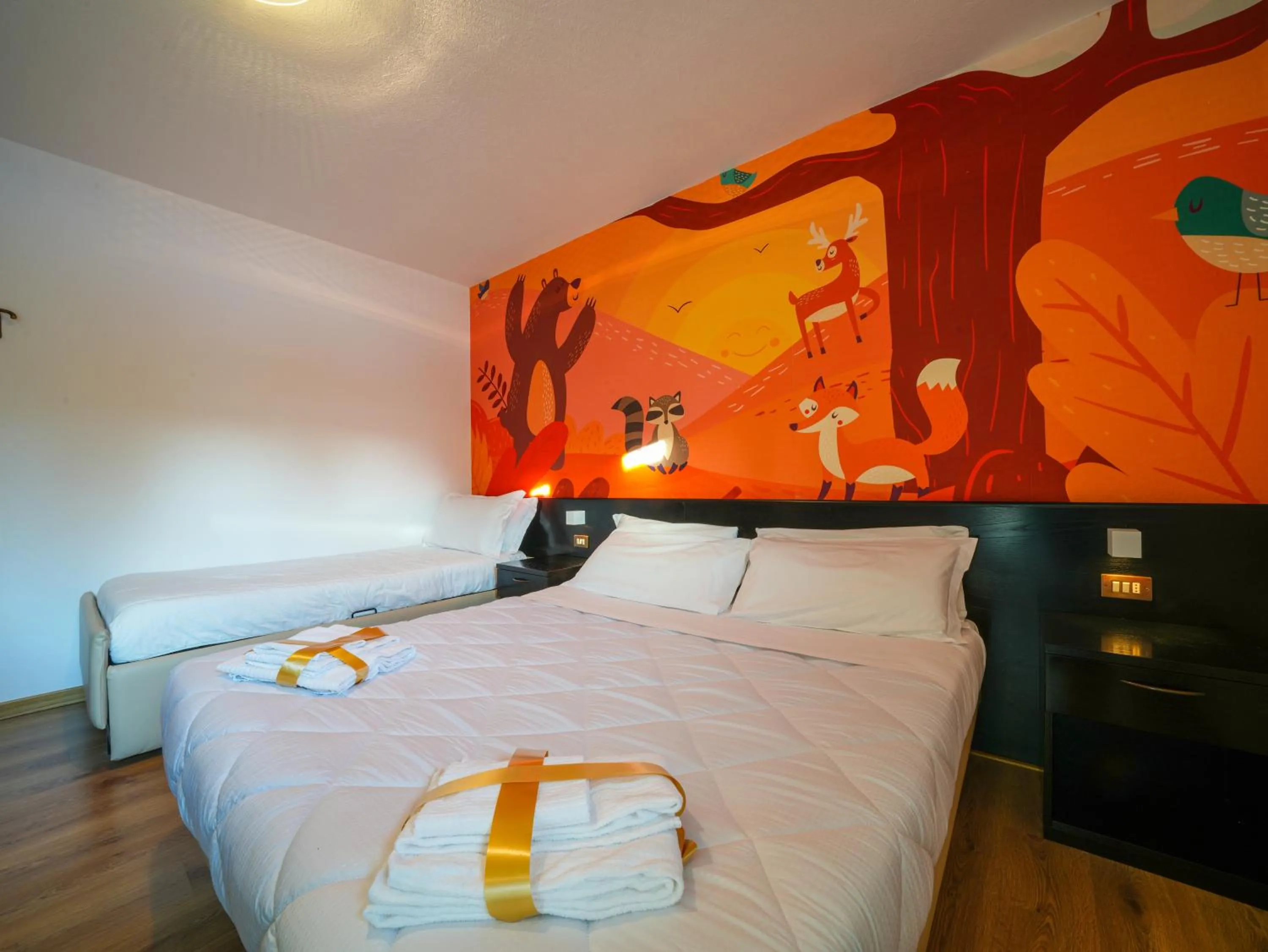 Bed in Hotel Arlecchino - Dada Hotels