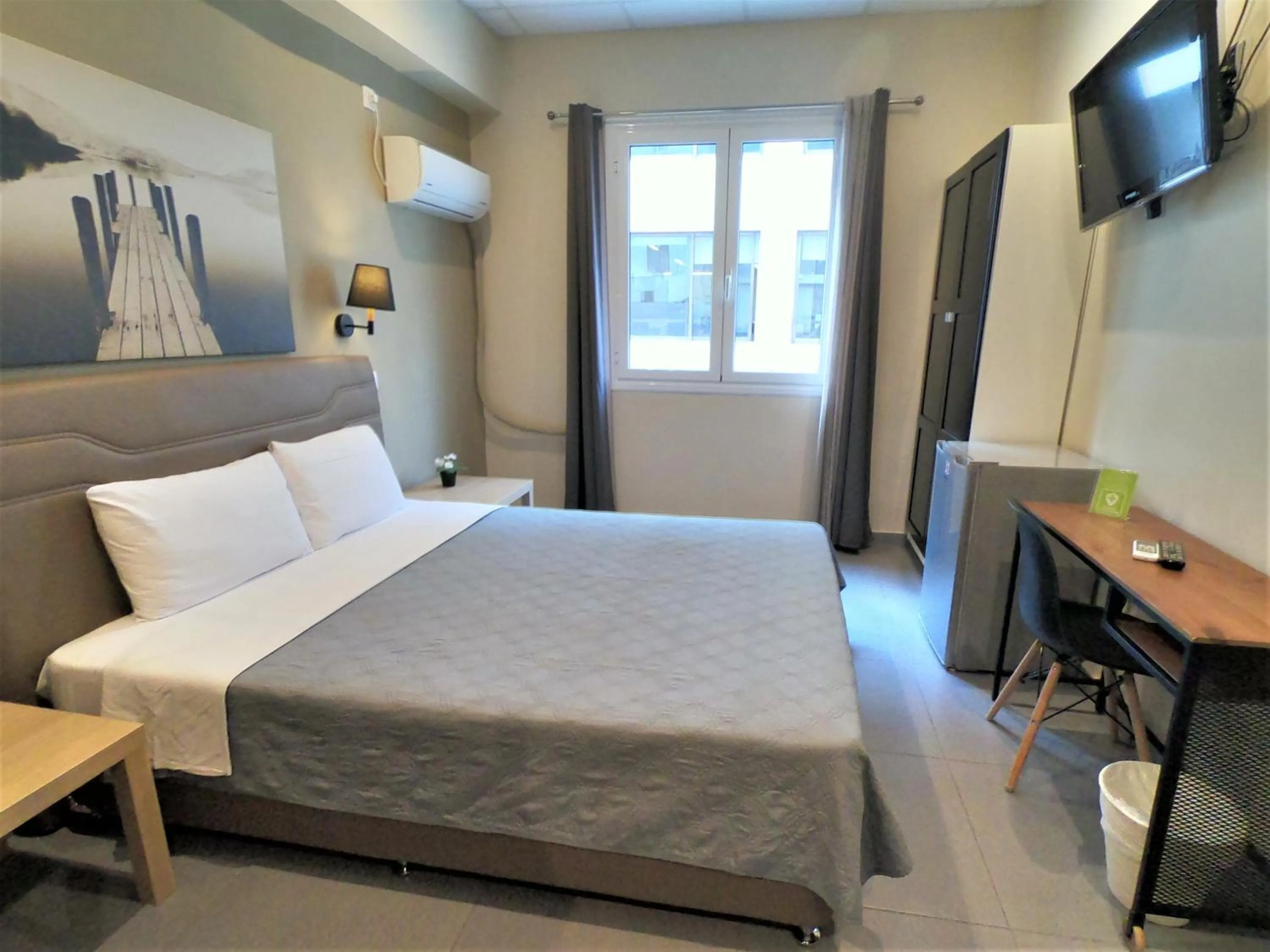 Bedroom, Bed in Achillion Hotel Piraeus